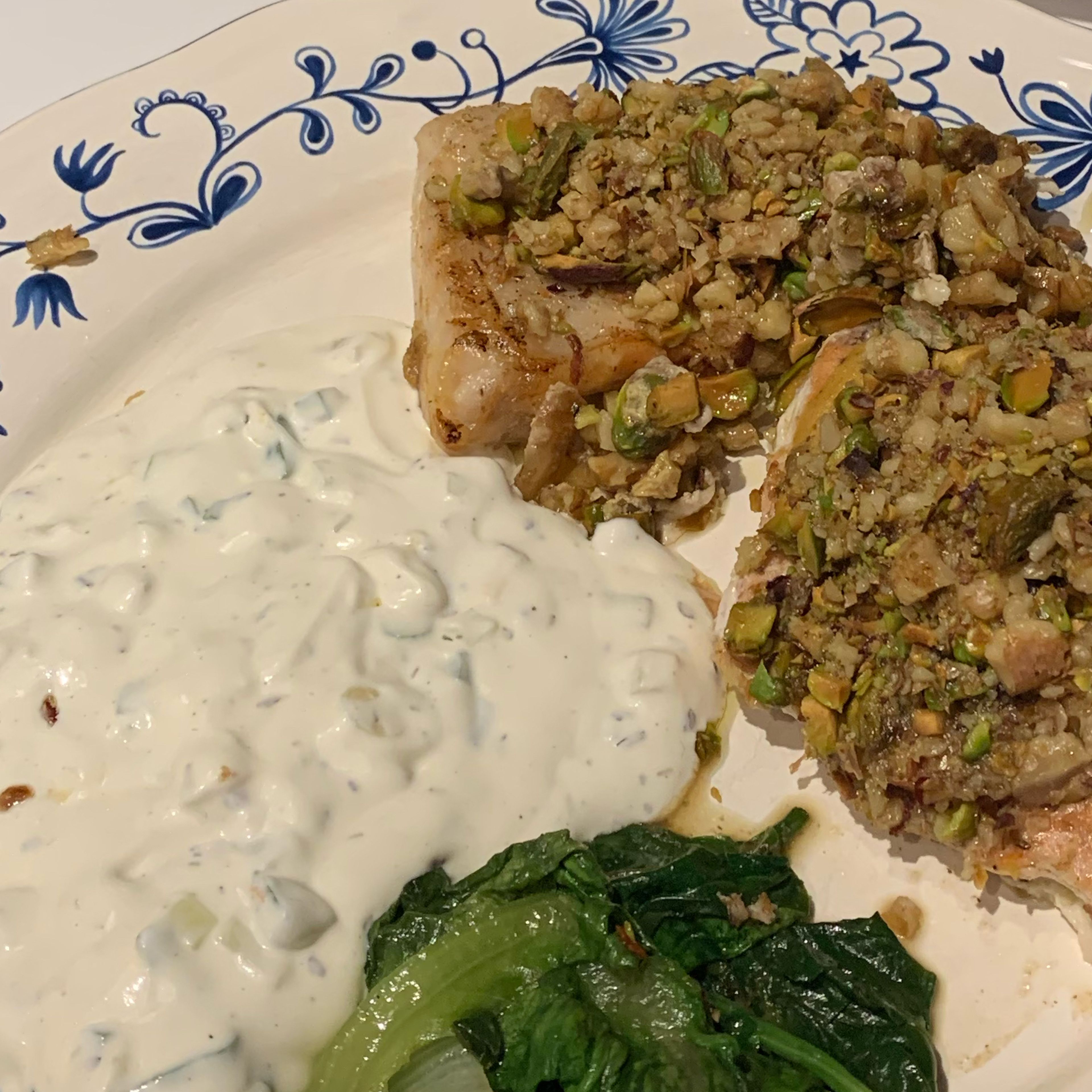 Keto salmon with nuts, salad and dressing