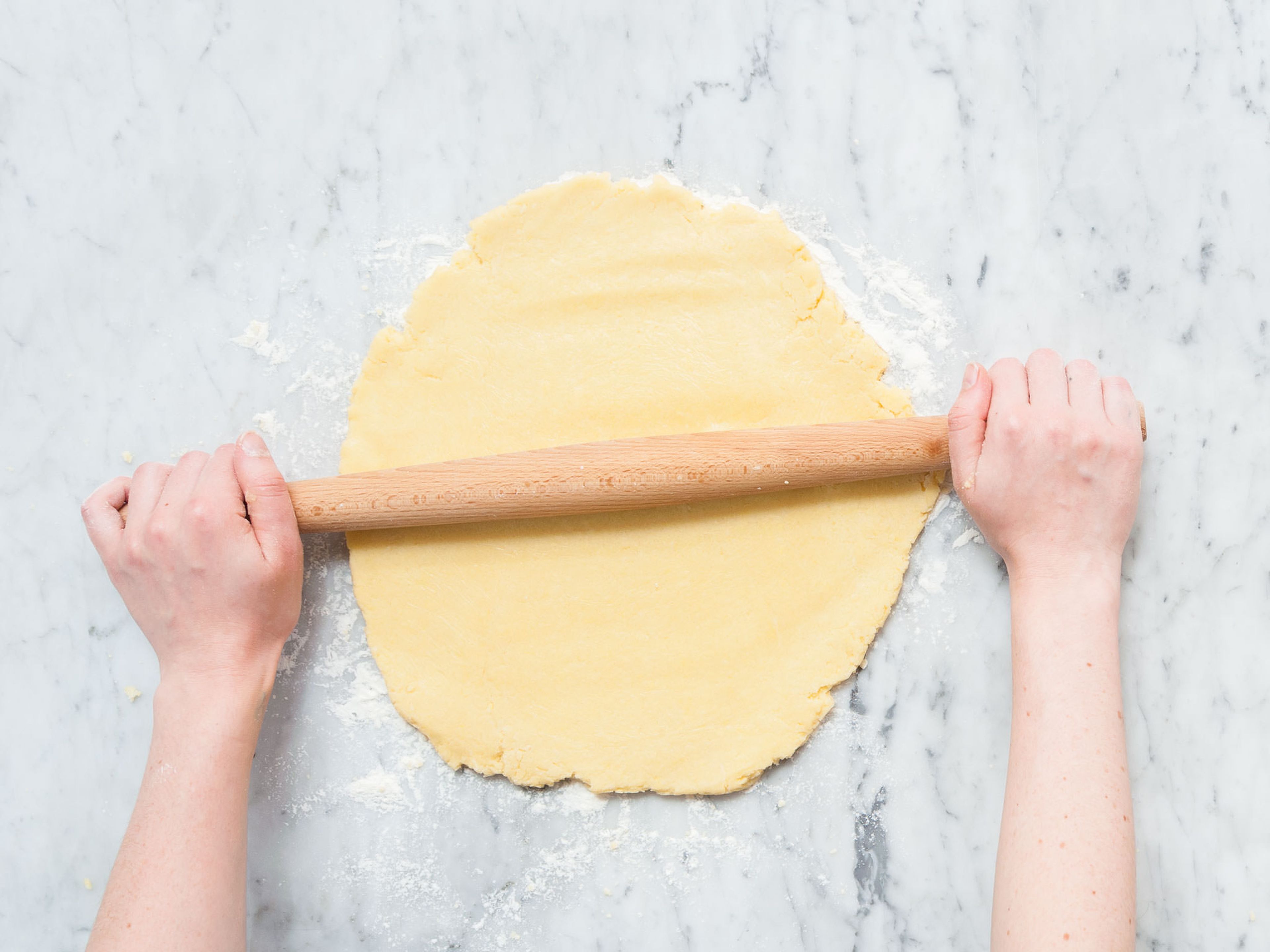 Add flour, sugar, baking powder, salt, butter, and eggs to a large mixing bowl and mix with a hand mixer until combined. Transfer dough onto a floured work surface and roll out until it’s approx. 1-cm/0.5-inch thick. Cut into rectangles using a knife or pastry wheel,