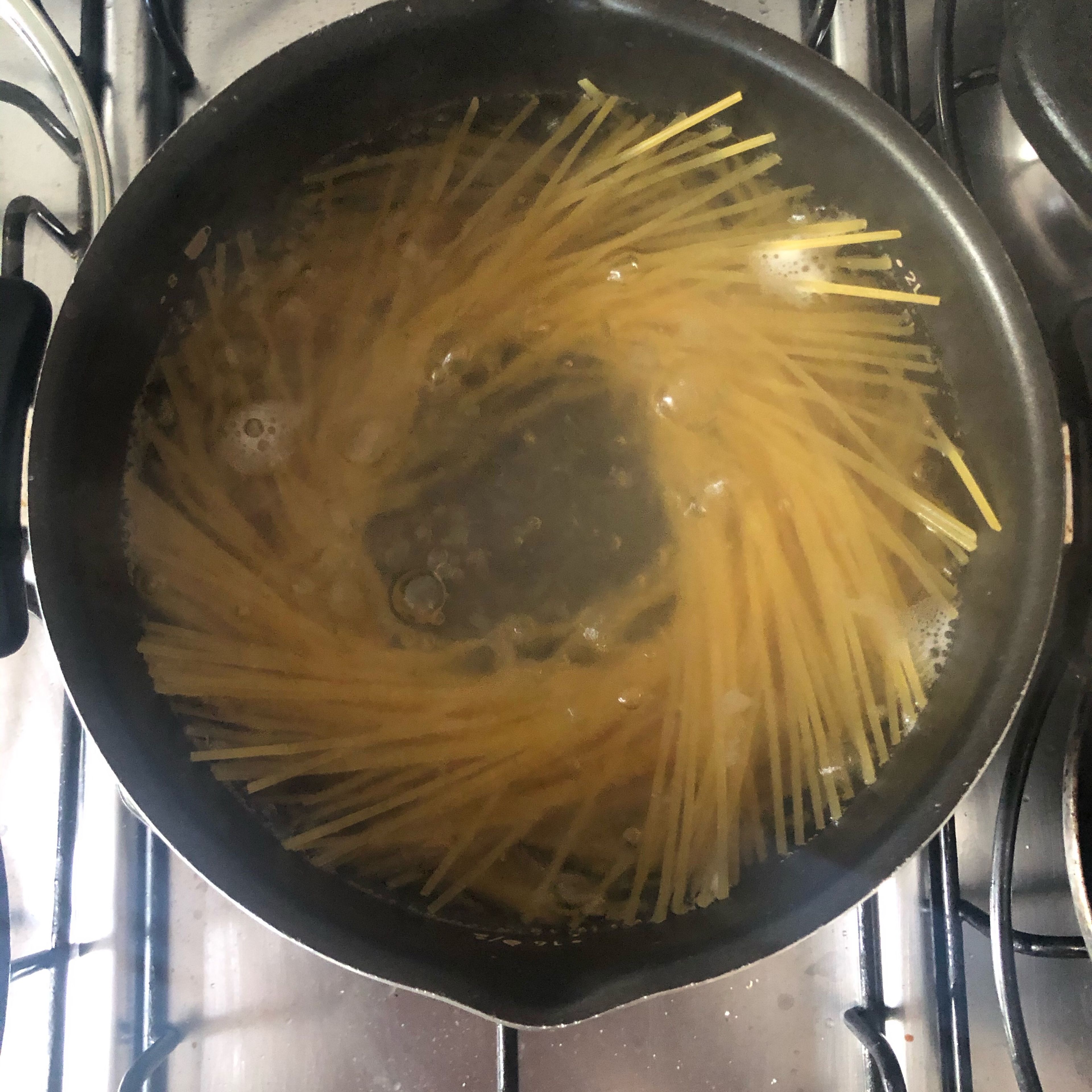 Start boiling the water to cook the pasta. Sprinkle a few amount of salt in the water and when it’s boiling star cooking the pasta. 