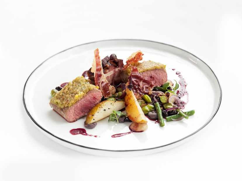 Pistachio-crusted lamb with pears, beans, and bacon
