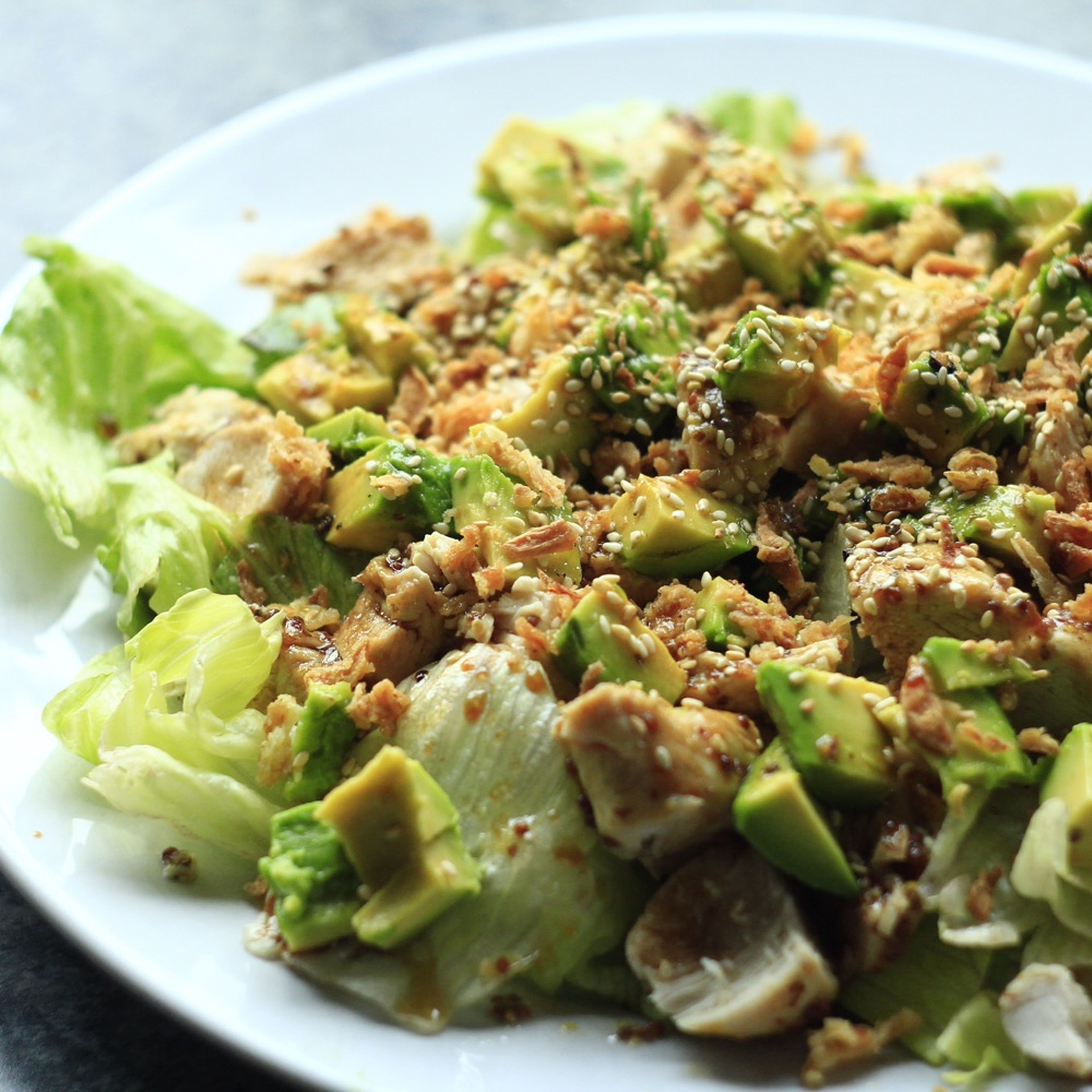 Chicken salad with crispy onions and sesame