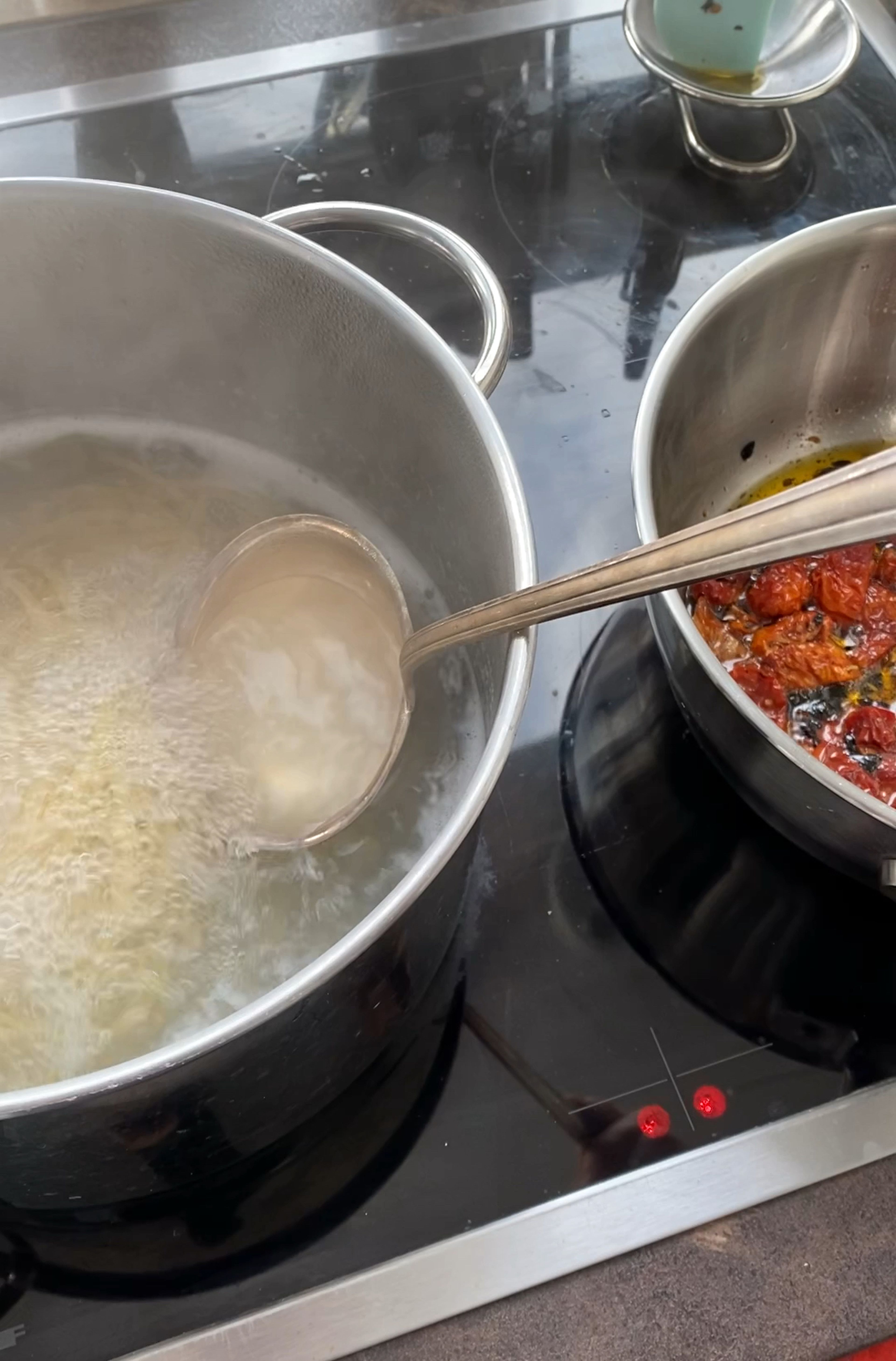 Right before the pasta is ready, use a big soup ladle to transfer some of the salted pasta-water to the pan (approx. 1-2 times). Stir in the water and put the pan on high heat to reduce the liquid.