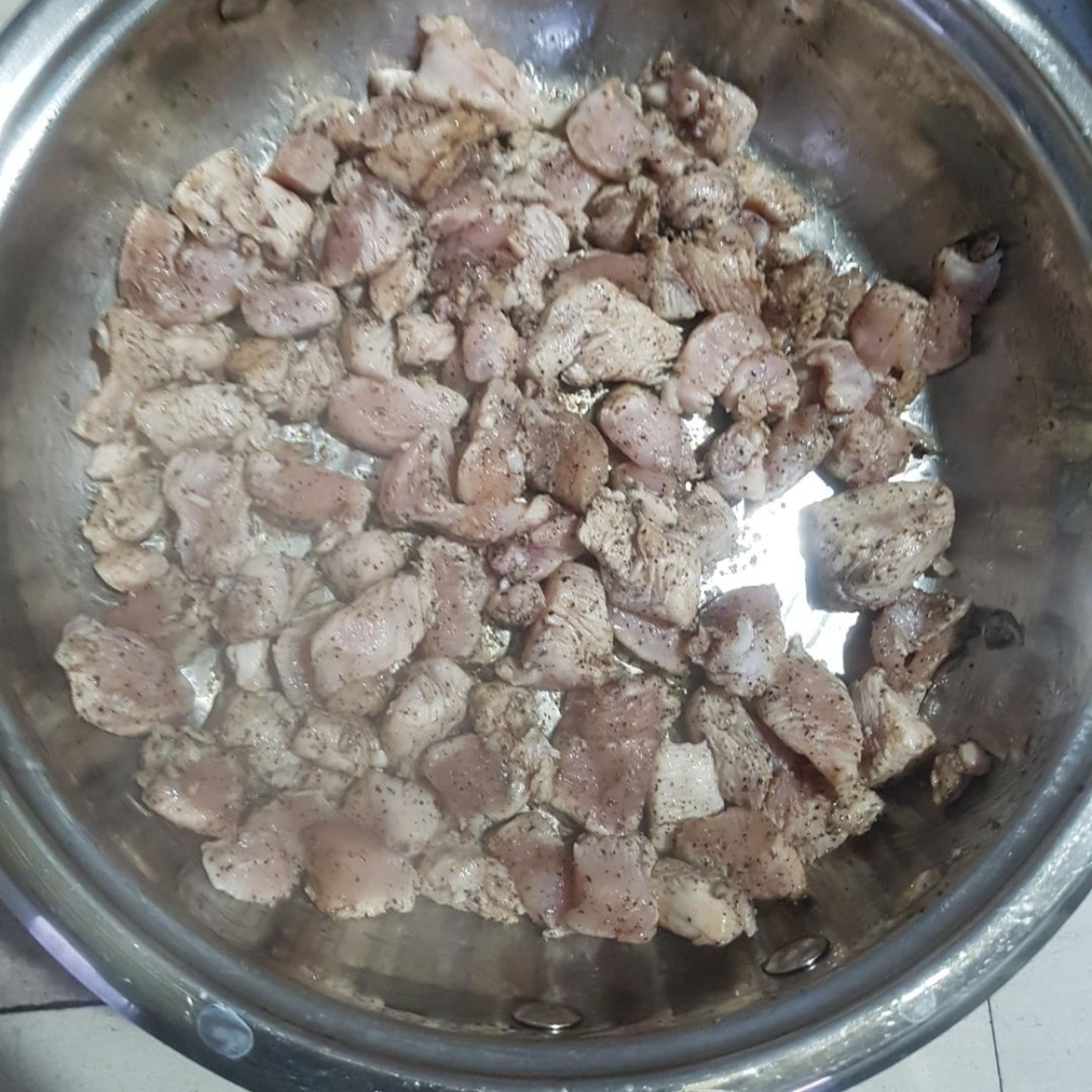 Fry the diced chicken breast using a pan