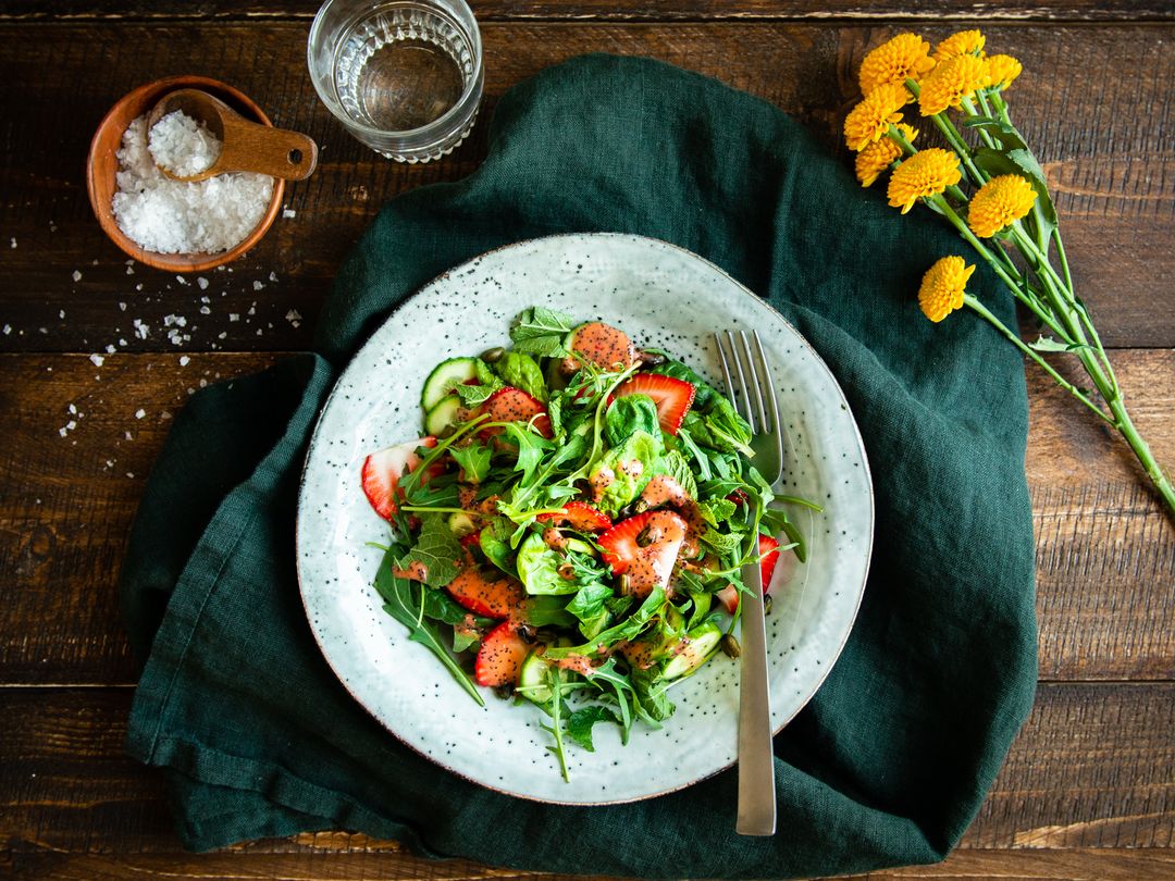 Green salad with strawberry-mustard dressing
