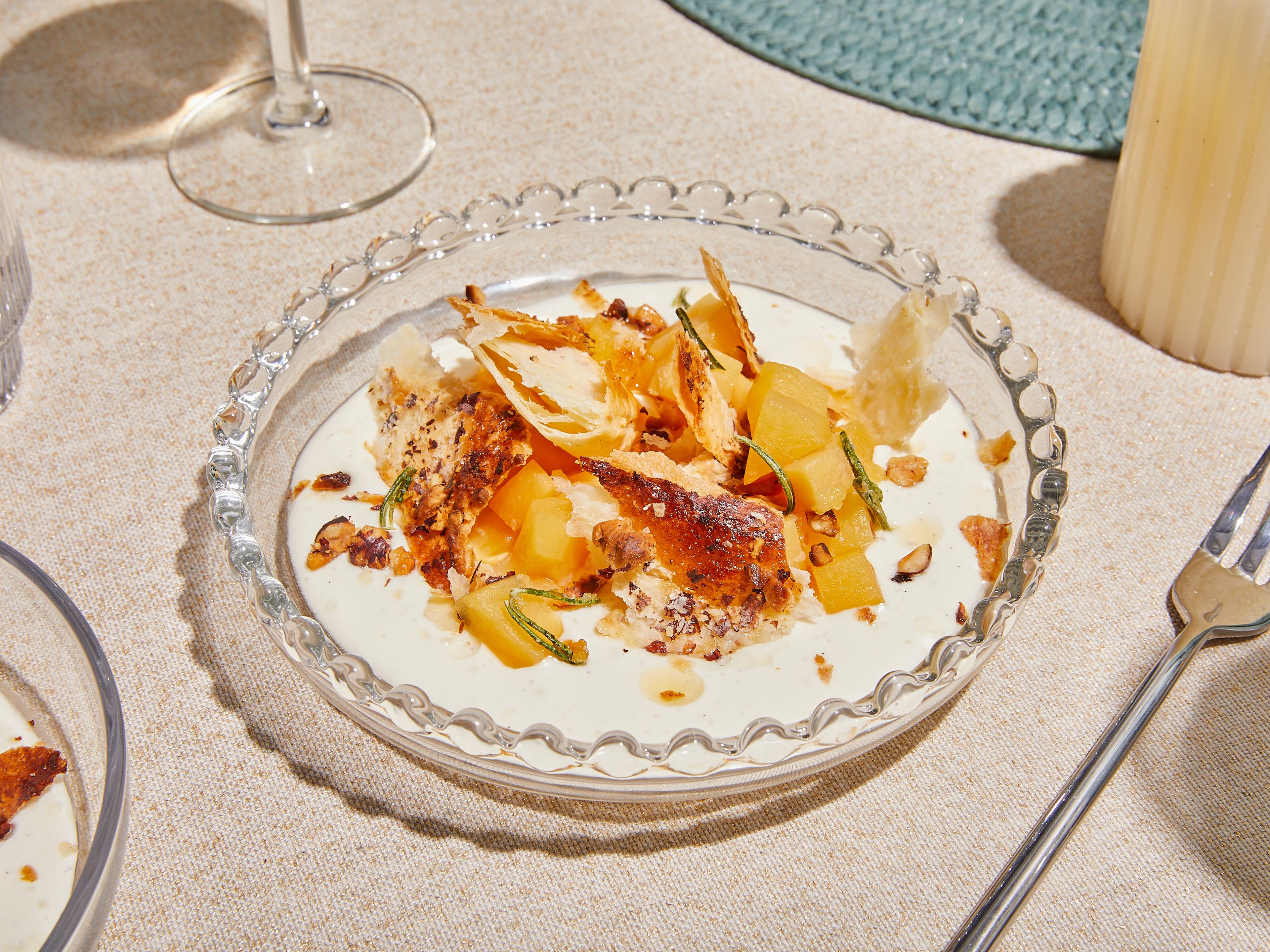 Poached quince with mascarpone and hazelnut crunch