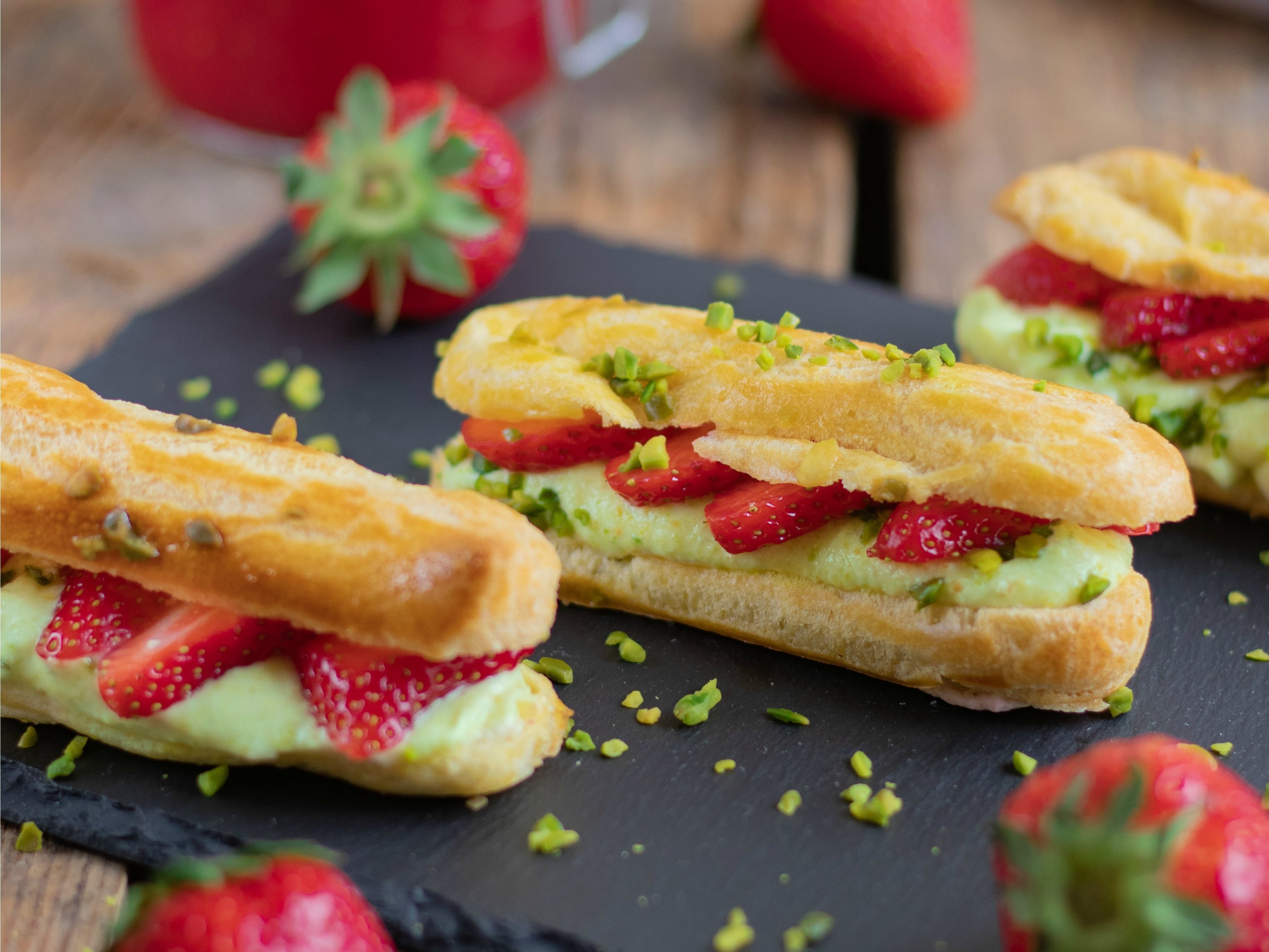 Strawberry and pistachio éclairs