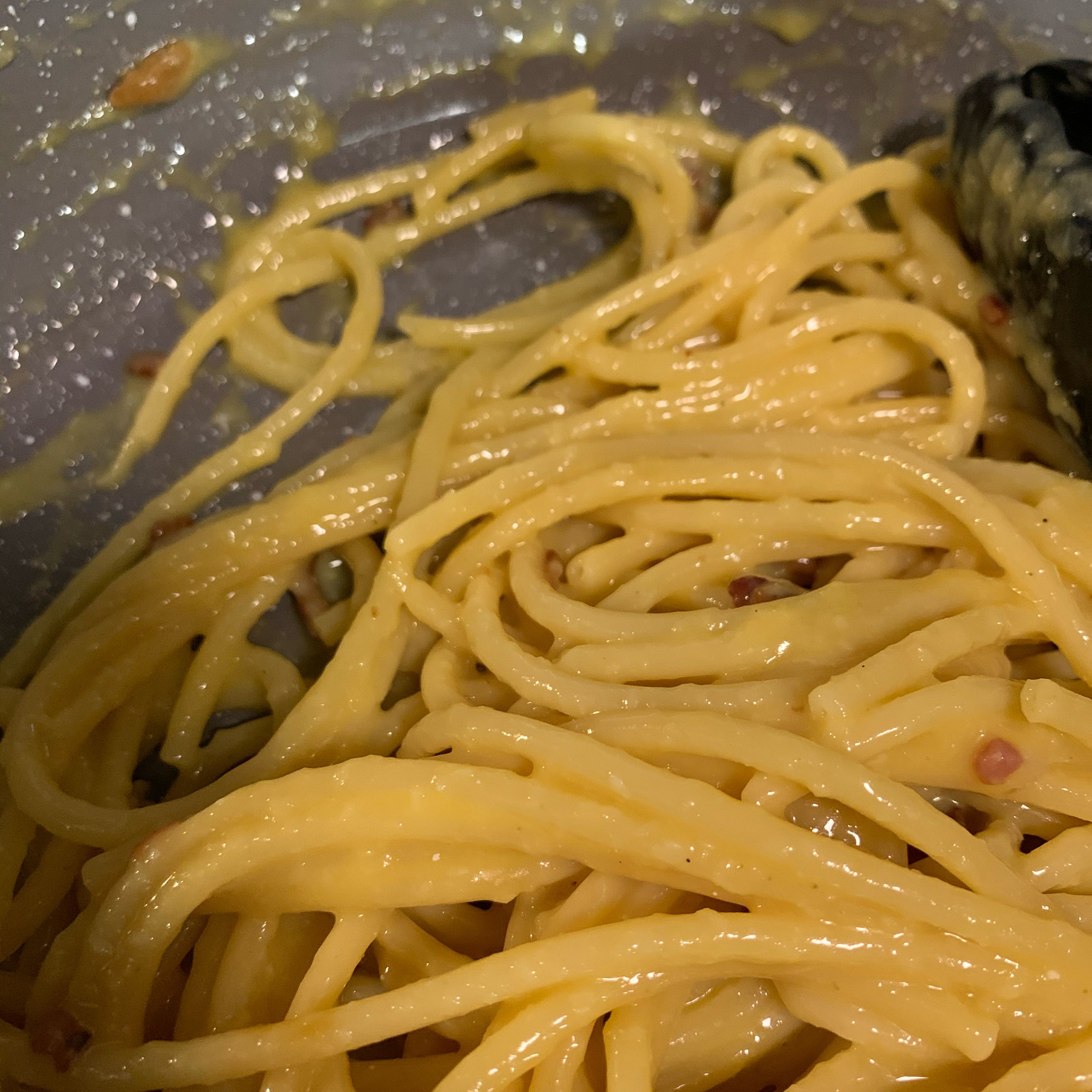 You want sauce to be smooth, not clumpy like mine is. Add very small amounts of left over pasta water until it is smooth.
