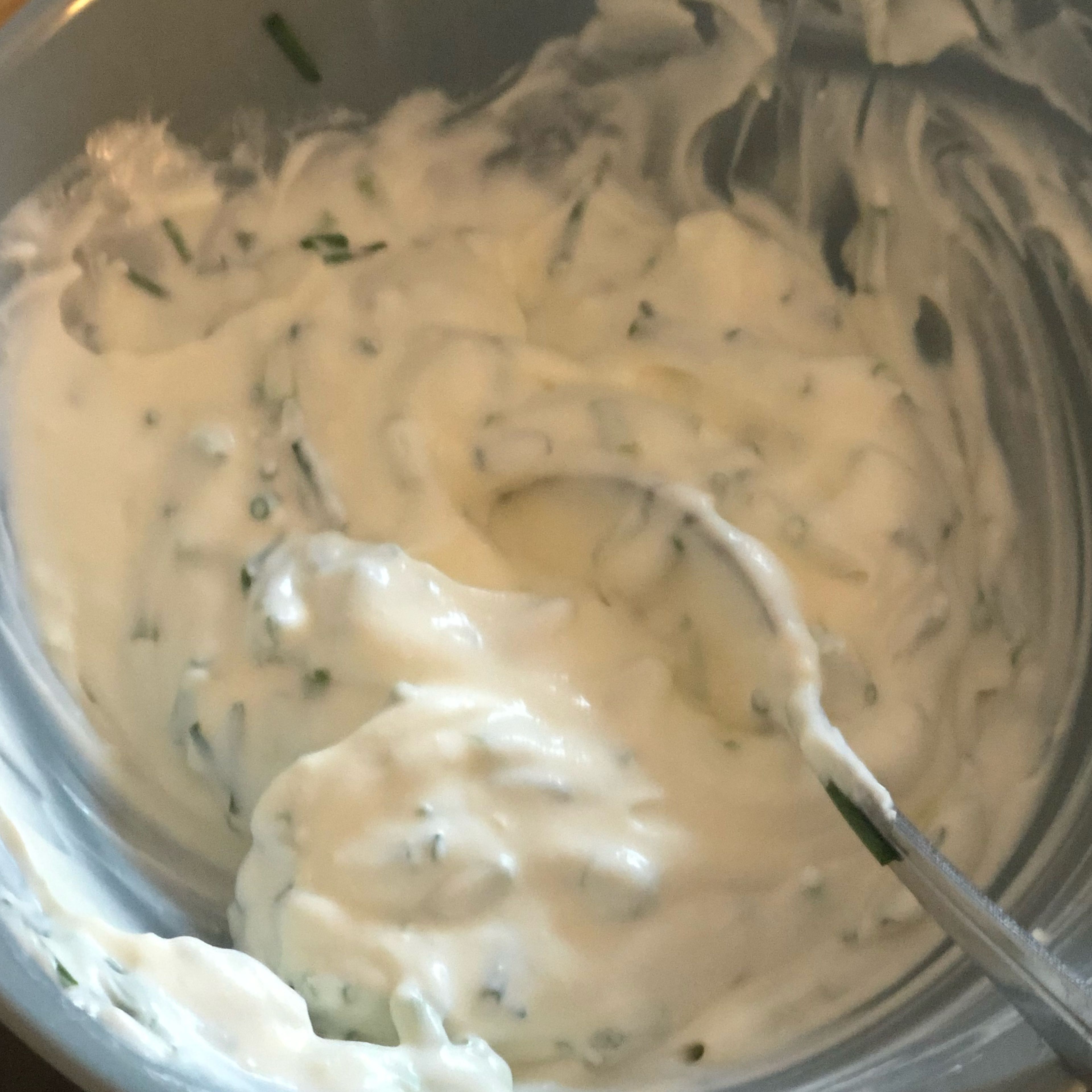 Mix the sour cream, chives, lemon zest and some salt and pepper in a bowl