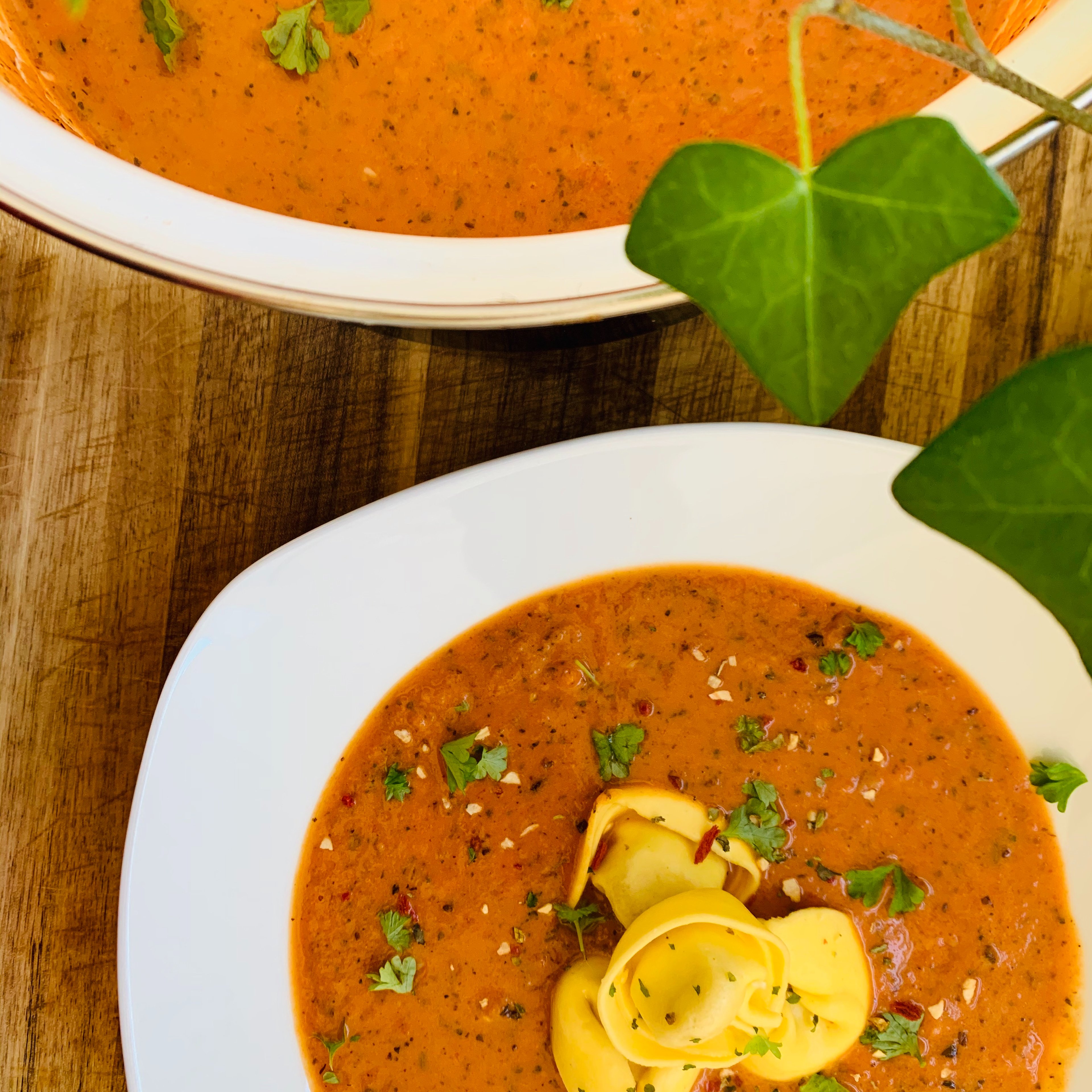 Tomato soup with tortellini topping