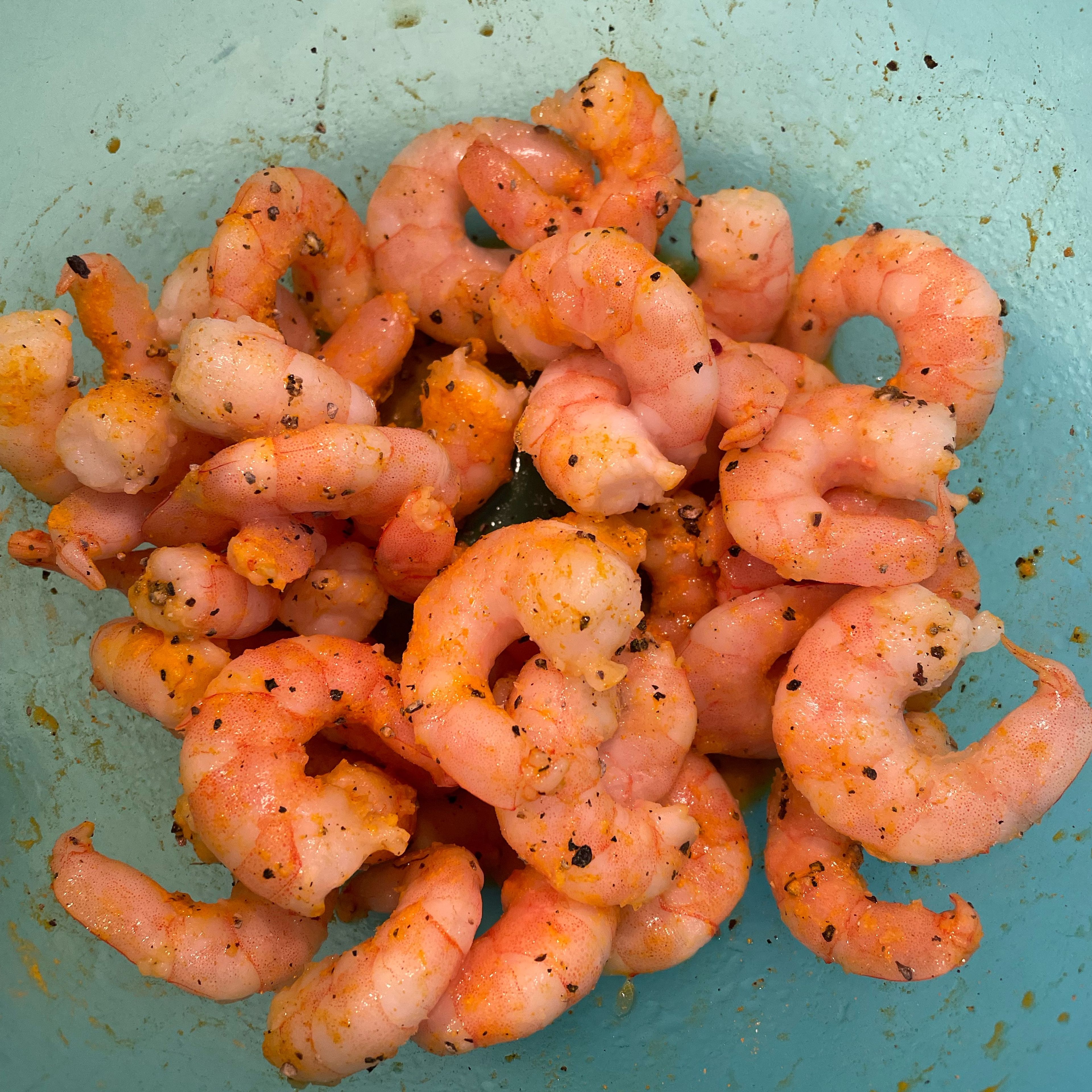 Marinate prawns with lemon juice, black pepper, turmeric and salt while preparing the other ingredients.