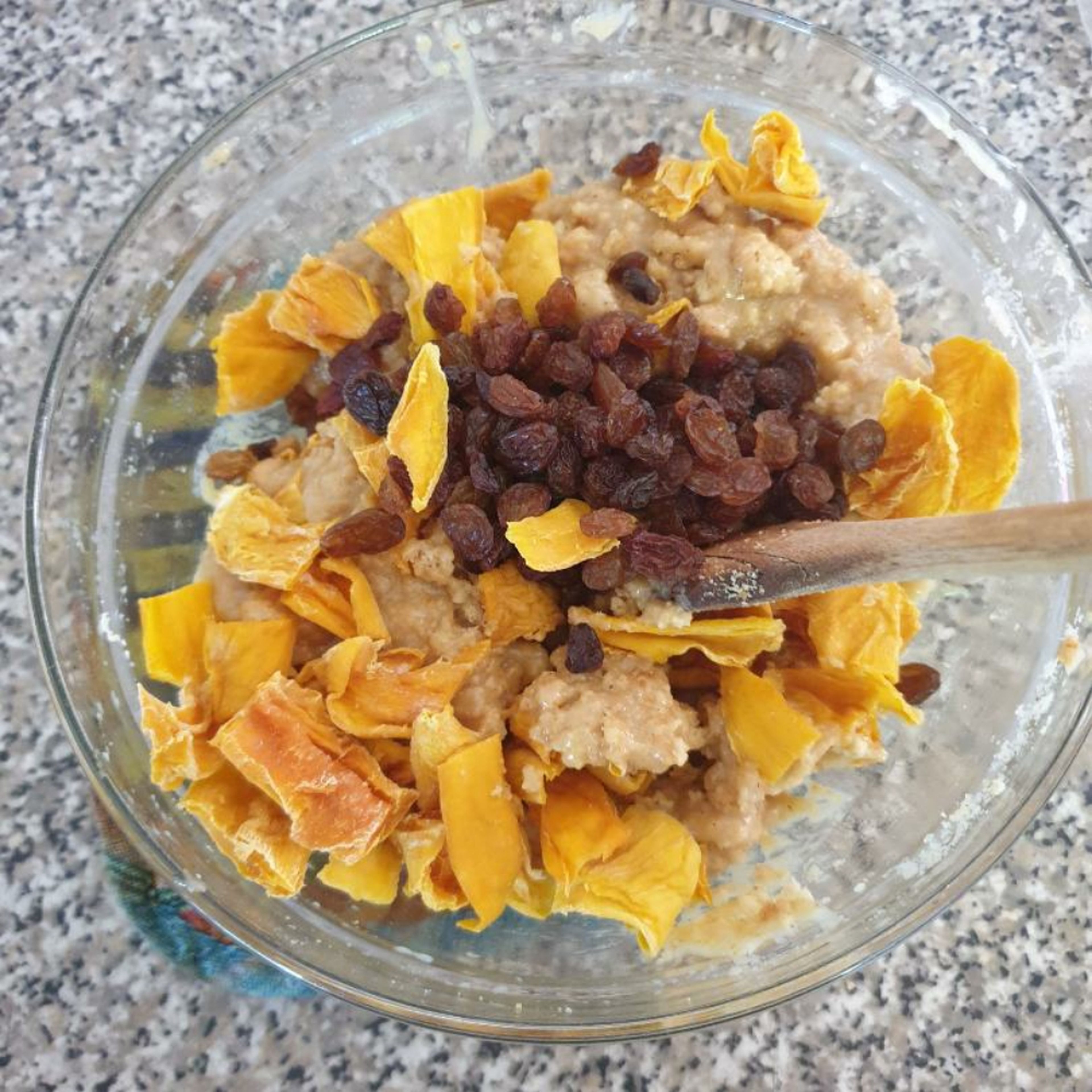 Add the mangoes and raisins and mix to combine; ensuring all the ingredients are combined with the chocolate mixture.