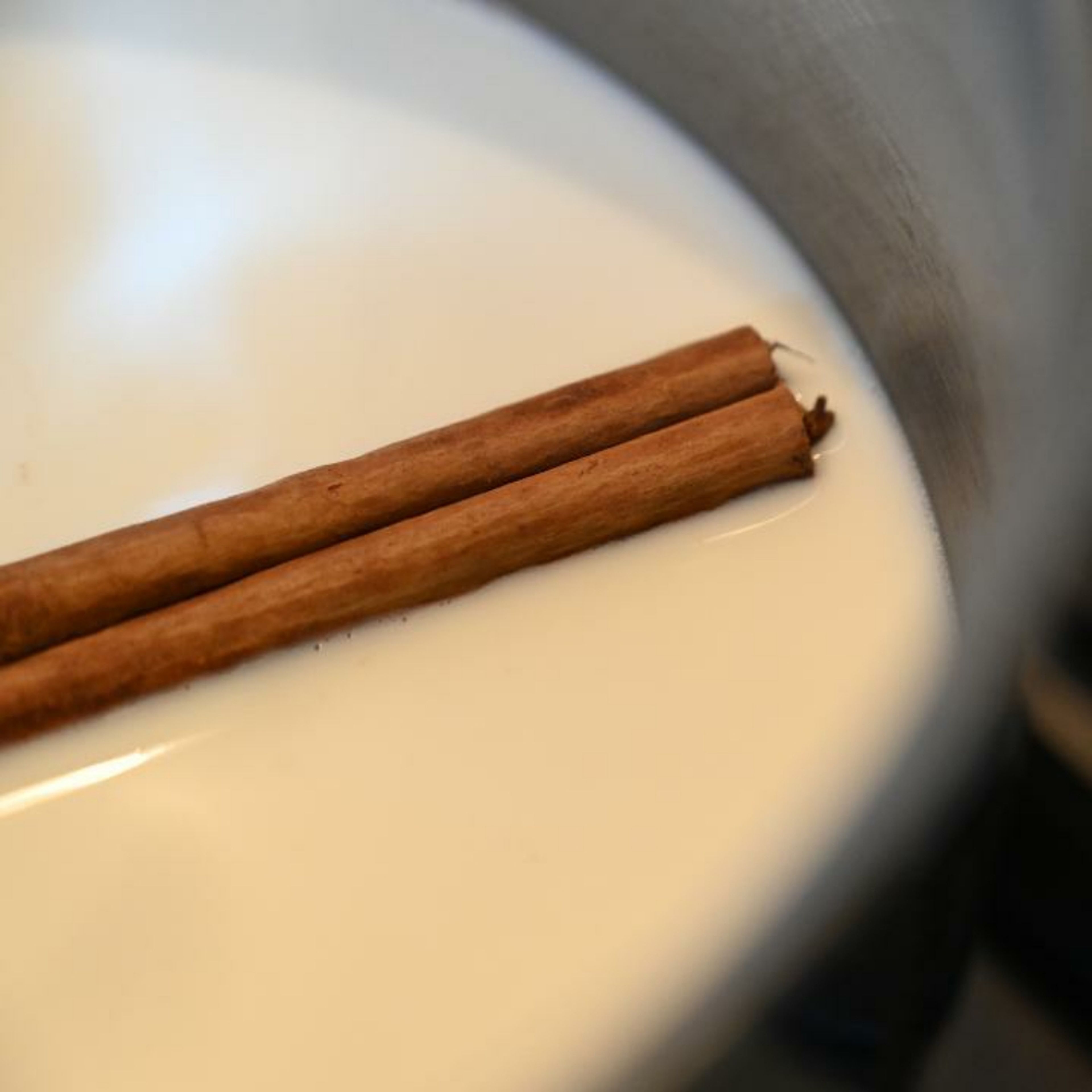 Place the cinnamon stick and milk in a pan and bring to boil. Turn off the heat and leave to infuse for 5 minutes.