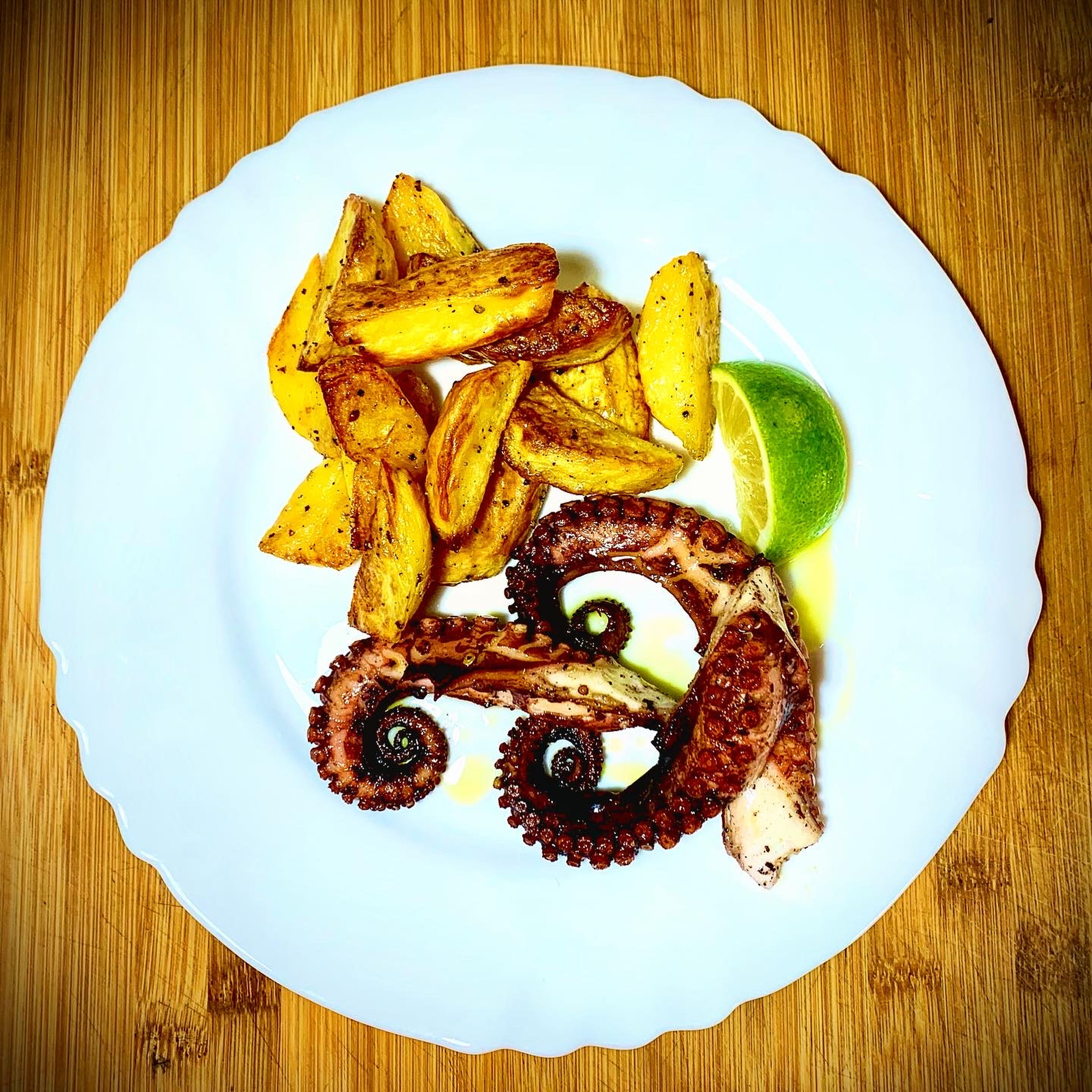 Octopus with baked potatoes