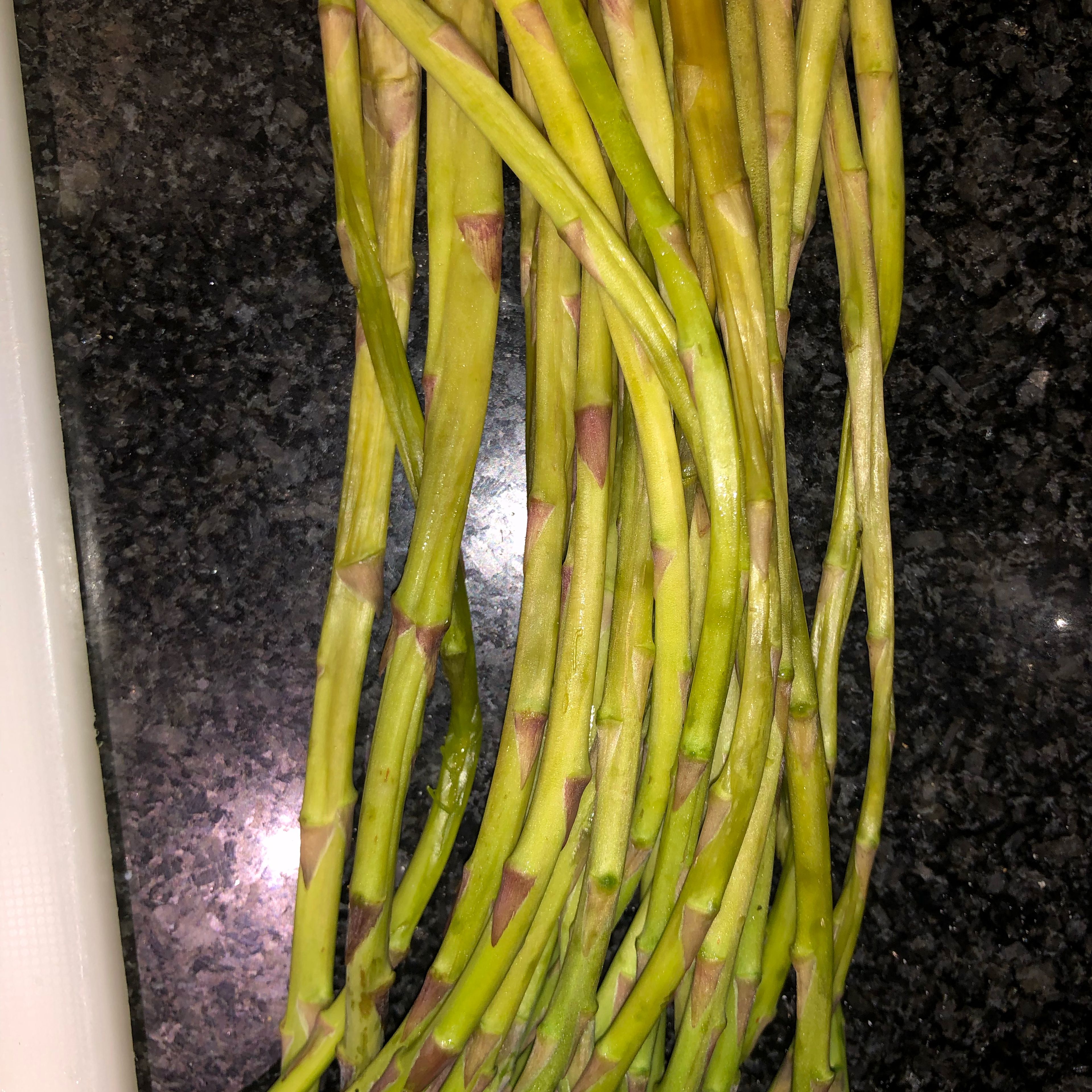 Chop the asparagus.