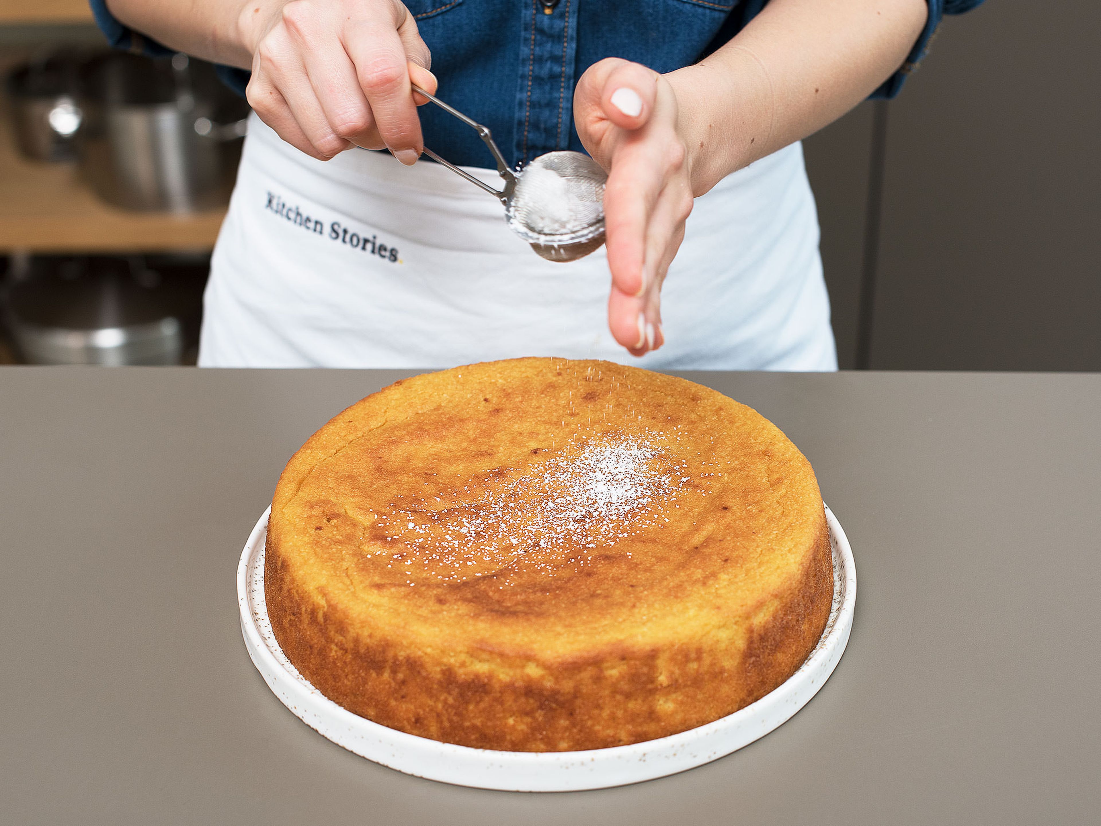 Remove cake from oven and place on a wire rack to cool before turning cake out of pan. Dust with confectioner’s sugar before serving and enjoy!