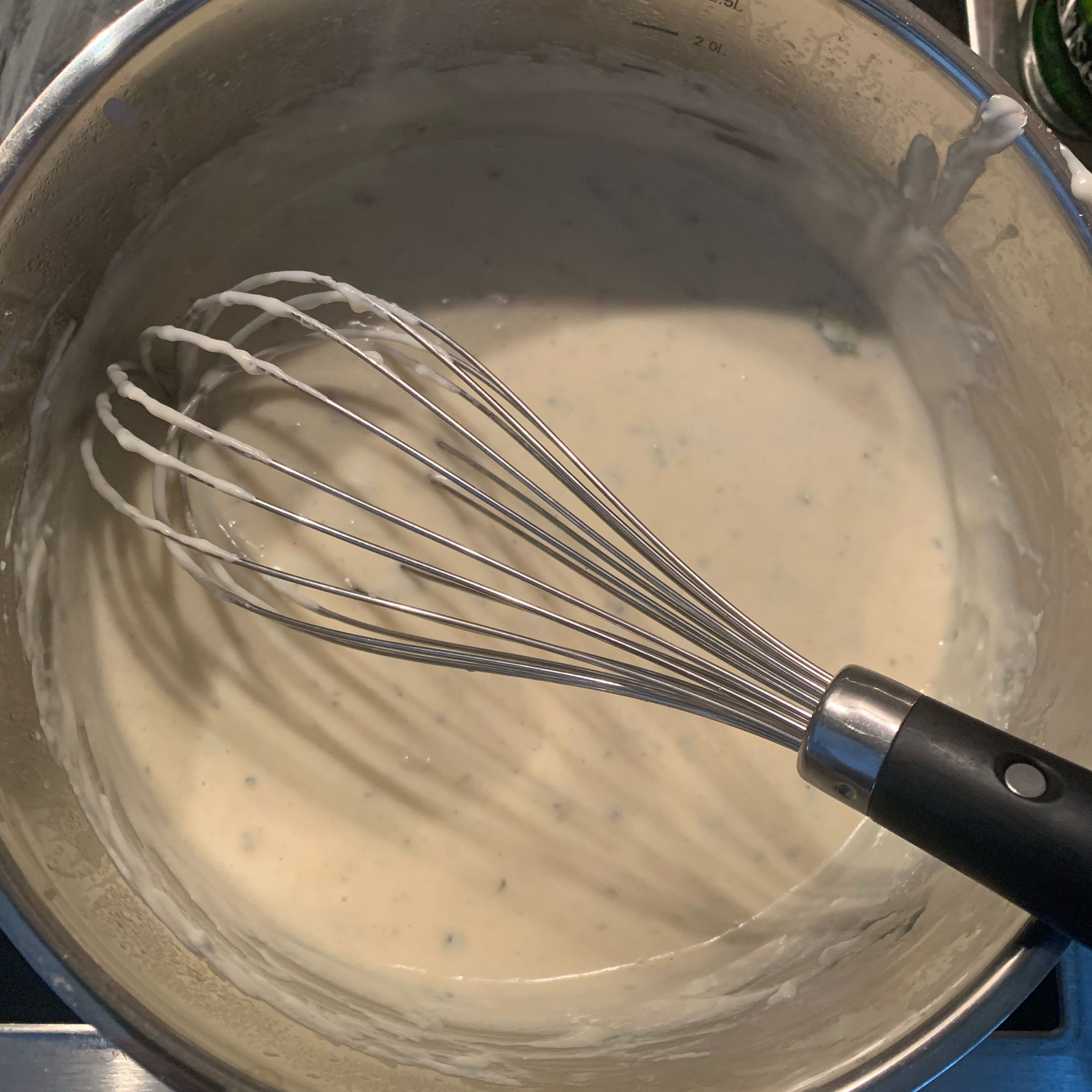 Remove béchamel sauce from fire. Cut Gorgonzola cheese into small pieces and add to the béchamel. Mix until obtaining a soft sauce.
