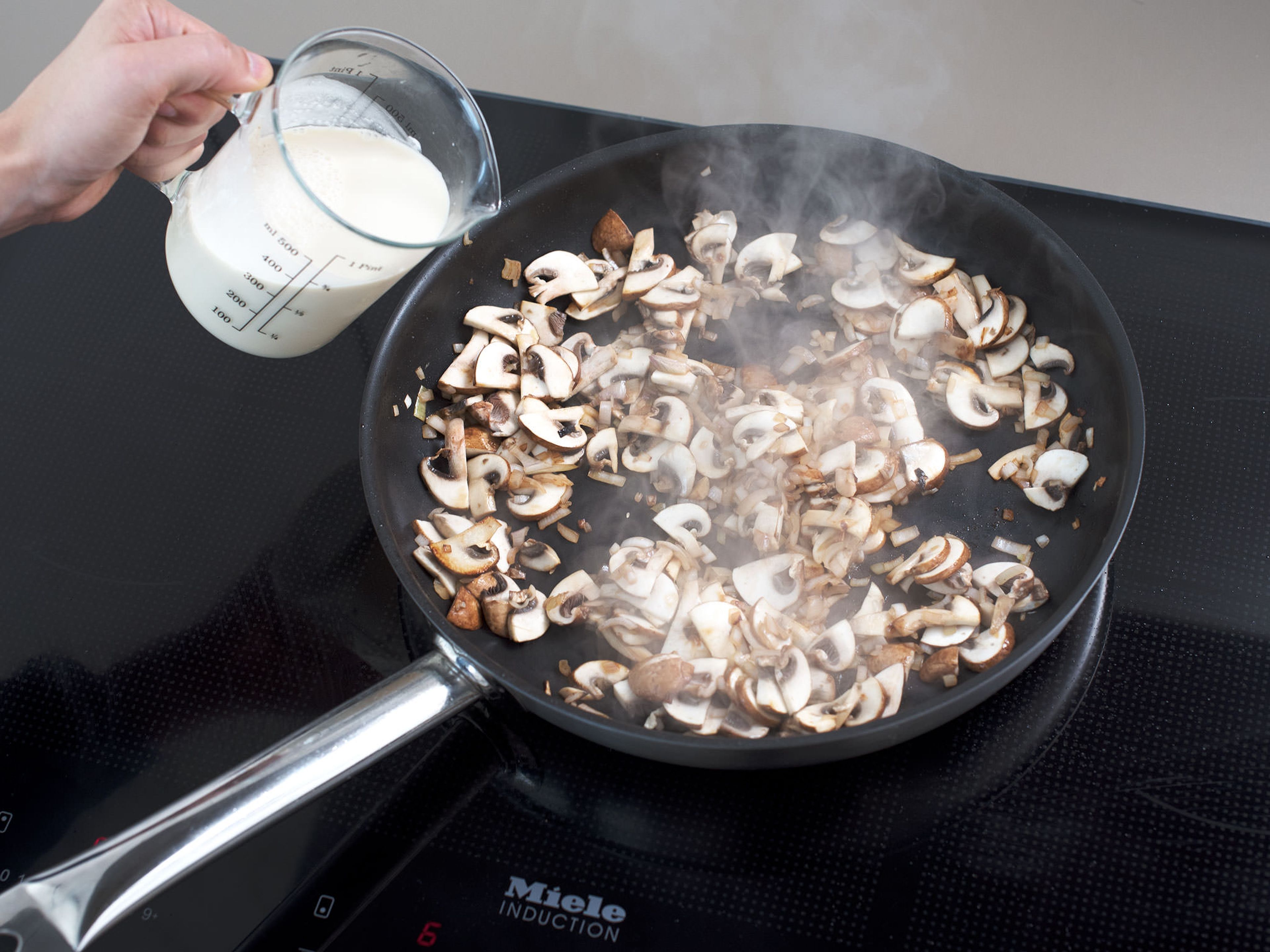 Add shallots and mushrooms to the pan, turn down heat to medium, and sauté for approx 5 min. Meanwhile, mix white wine, heavy cream, beef stock, and starch, and add to the pan. Stir until thickened slightly and heated through. Add meat back into pan and let simmer for approx. 2 min.
