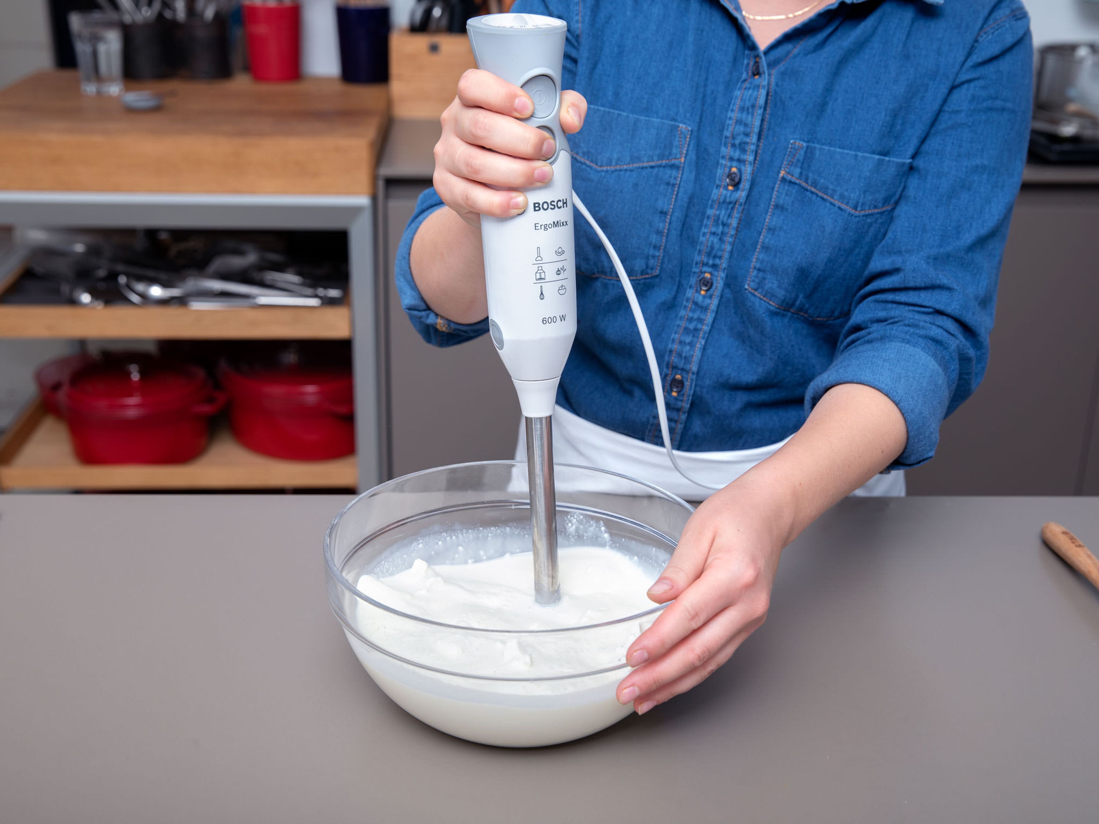 Add ricotta, sugar, milk, and heavy cream to a bowl and purée using an immersion blender until well combined. Juice and zest lemons, add to the bowl and stir well.
