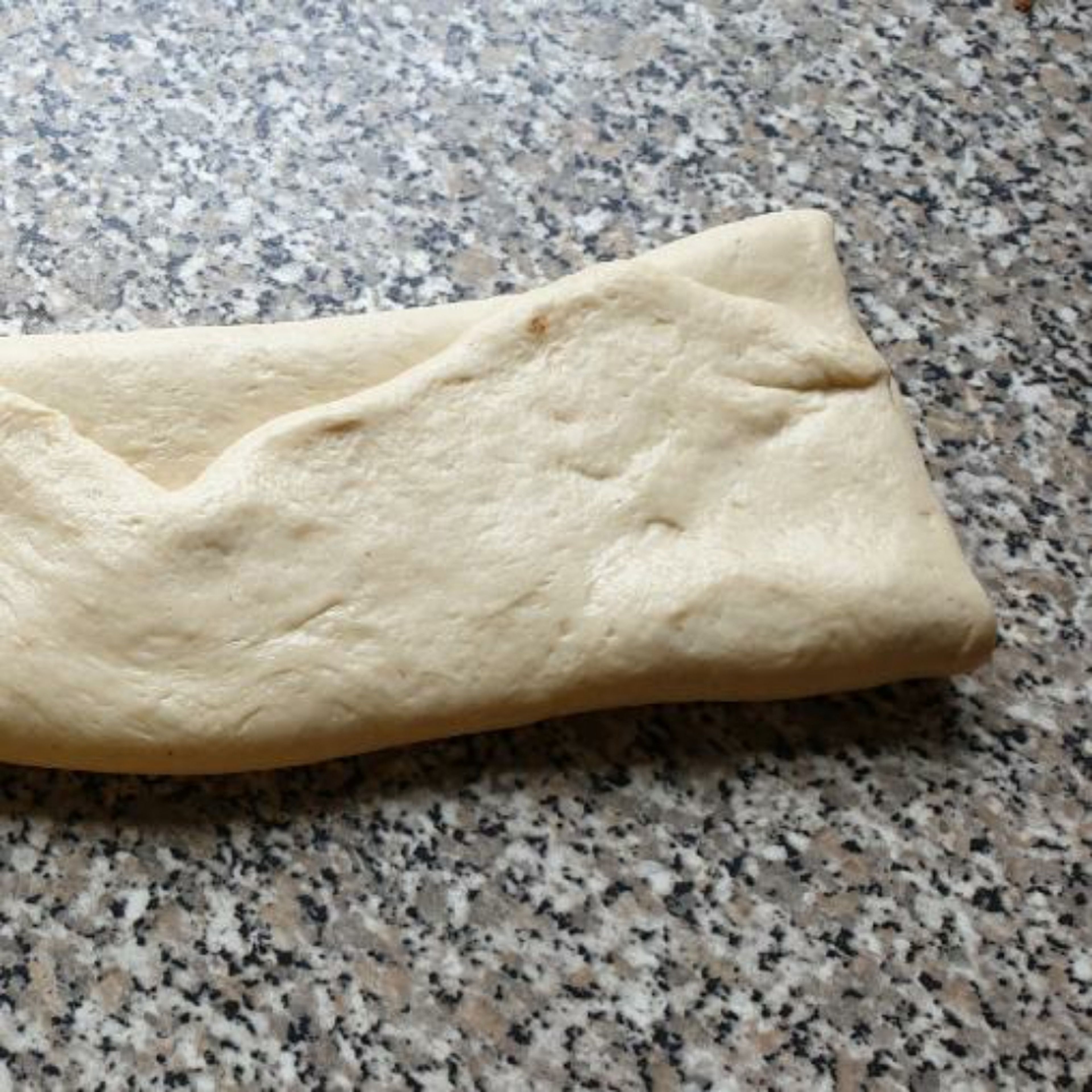 Fold the 2 long ends of the dough inwards- like a letter.