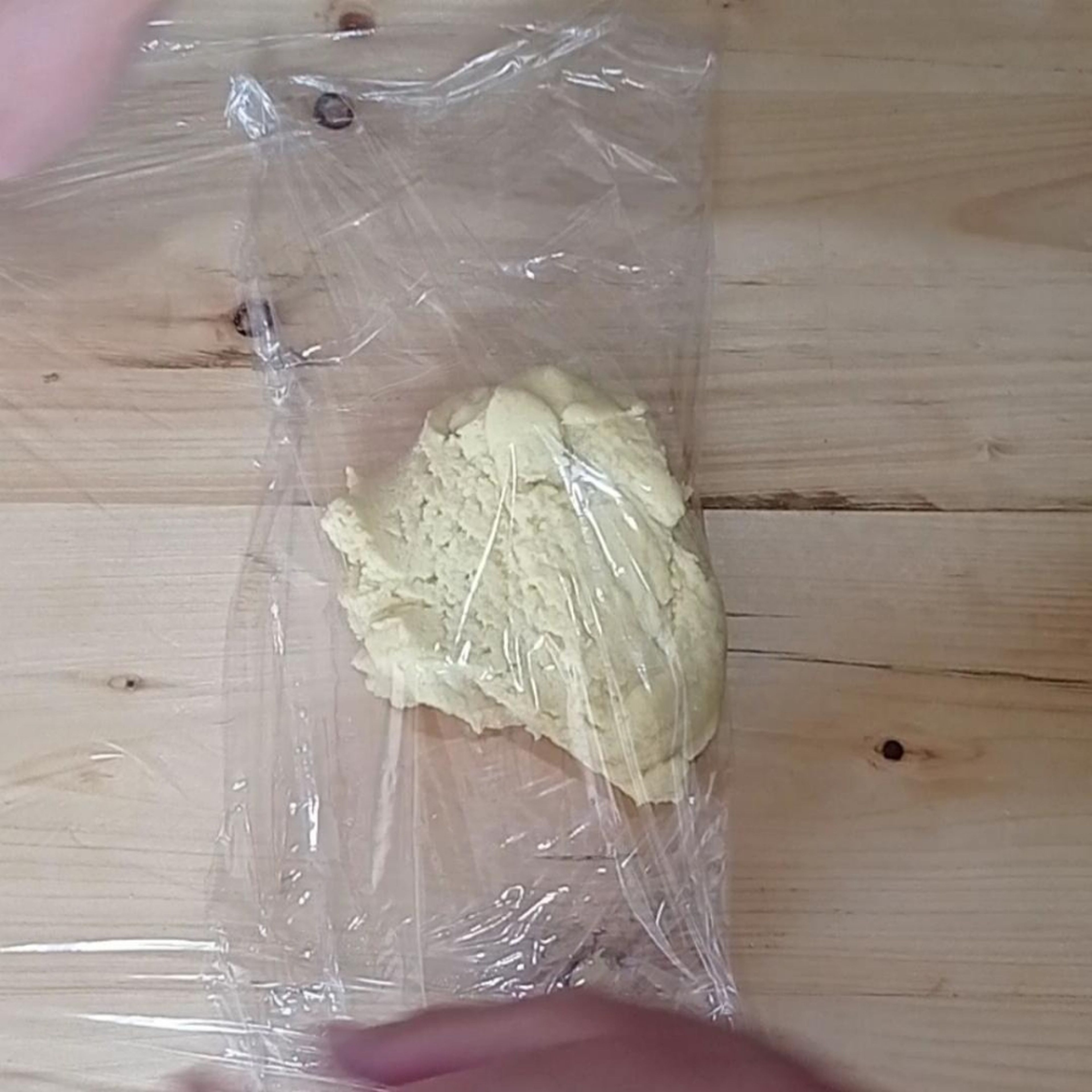 Wrap the dough with plastic wrap and keep in the fridge for 1 hour