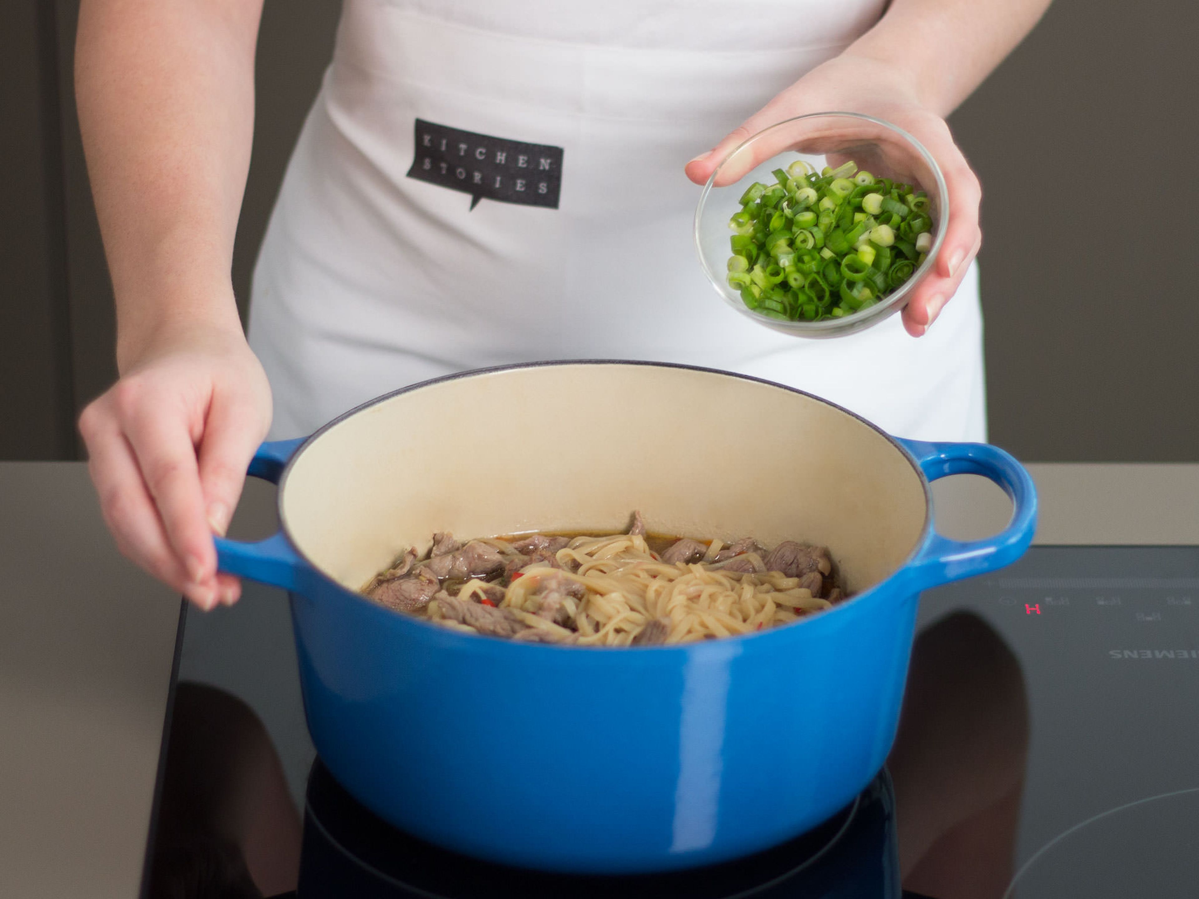 Add sliced beef and green onions and simmer for approx. 3 – 5 min. until the beef is just cooked. Add cilantro, salt, and pepper to taste. Enjoy!