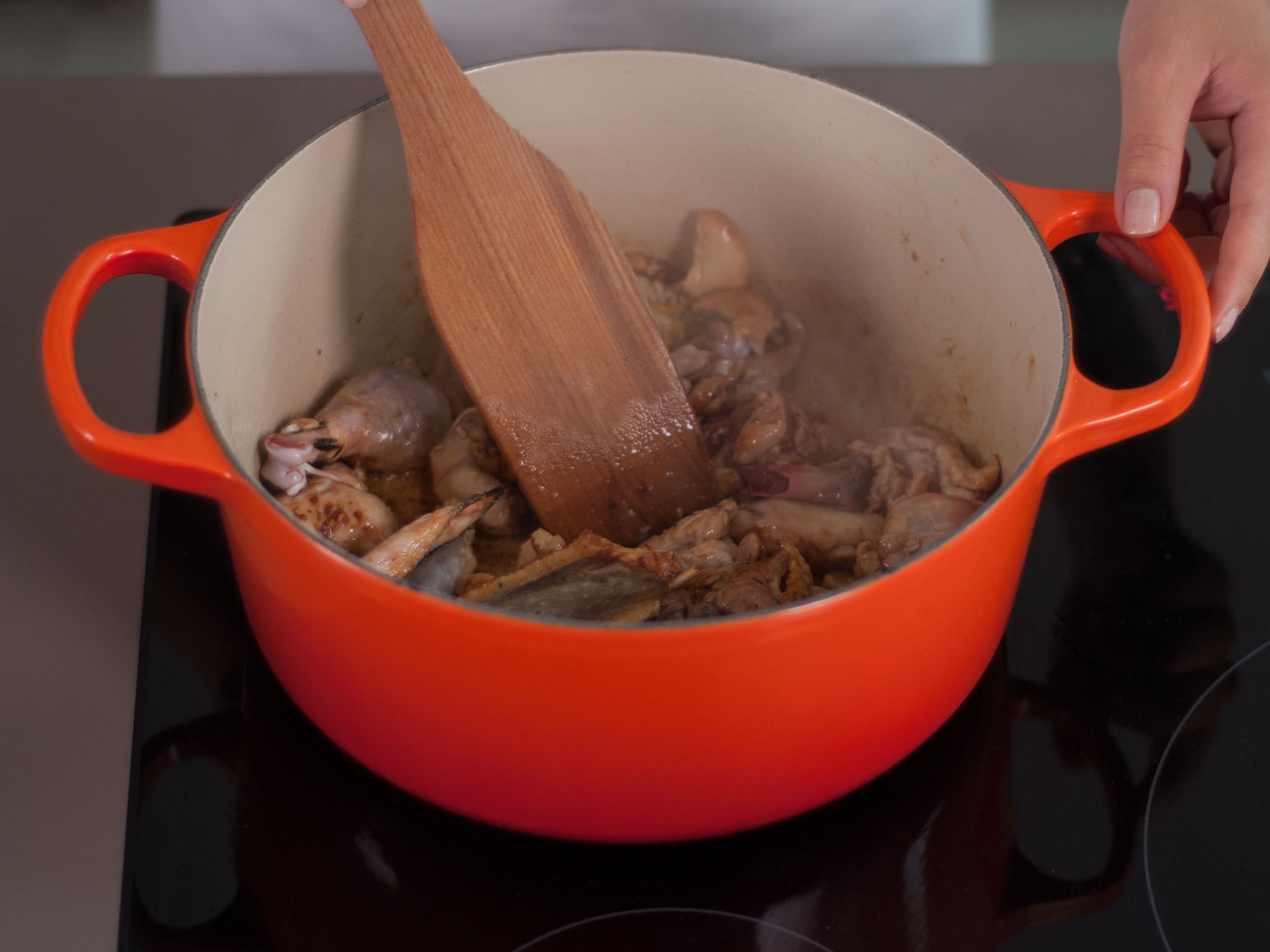Add vegetable oil and sugar to a large saucepan. Cook over medium heat until a dark caramel forms. Add chicken pieces and sauté for approx. 1 – 2 min. until browned.