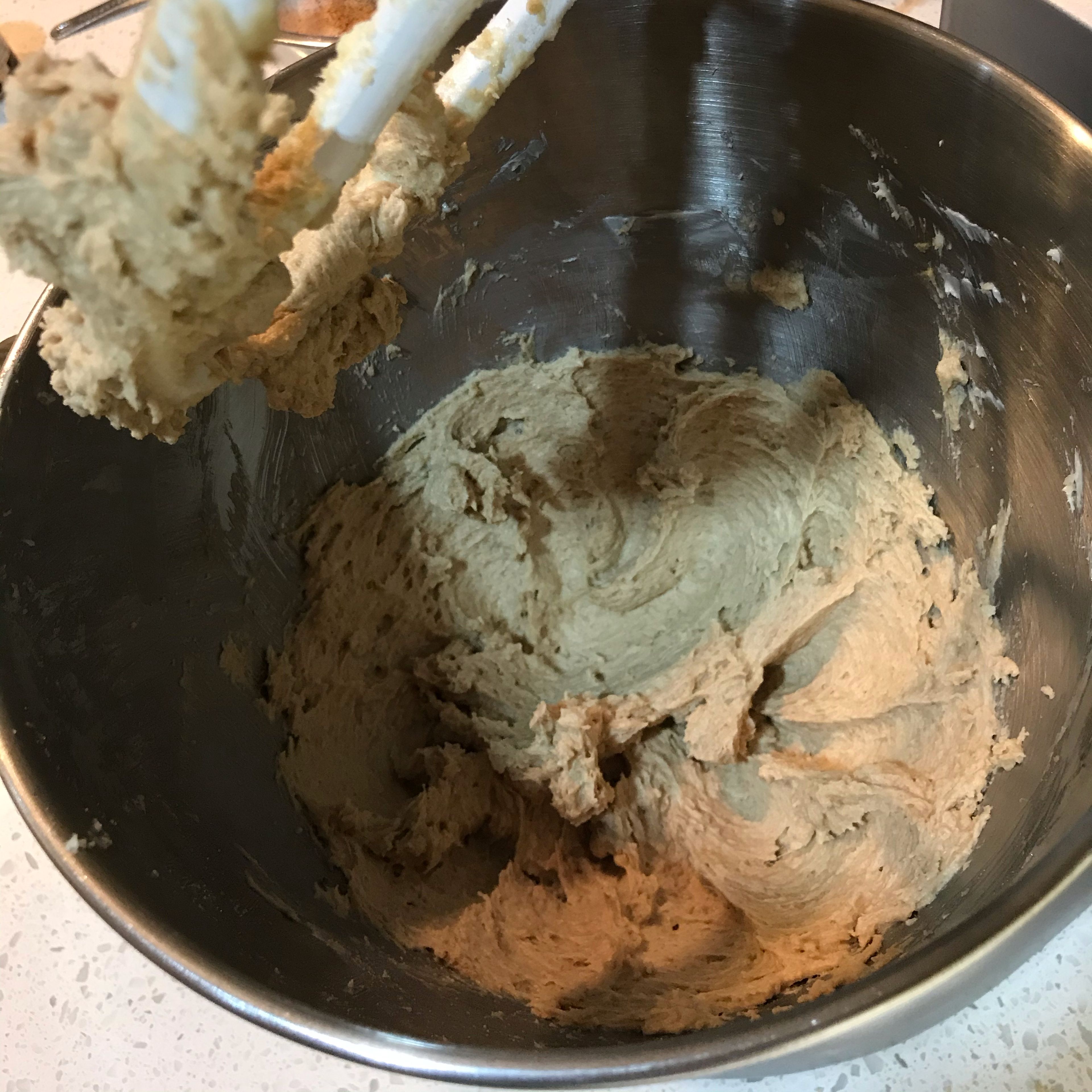 Slowly add the two types of sugar and salt into the creamed butter & ginger while mixing on low speed. Once combined, scrape down the sides of the bowl, then mix on medium speed for 4 minutes, until light and fluffy. If you are using table salt instead of kosher salt, use half the amount of salt.