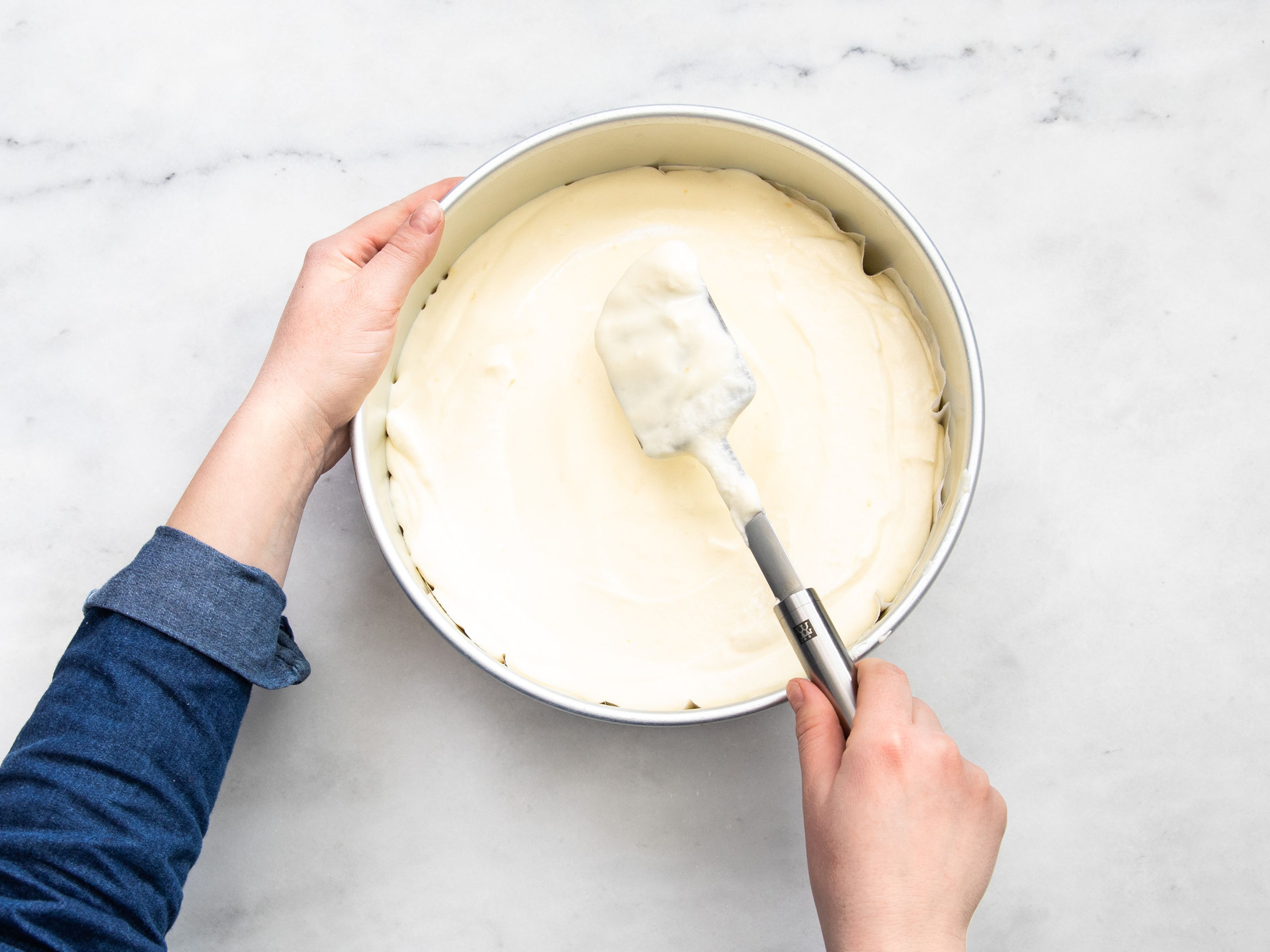 Pour the mixture into a parchment-lined springform pan, smooth the top, and bake for approx. 65 – 70 min. When finished, turn off the heat and let the cake cool inside the oven until room temperature, approx. 2 hrs. Dust with confectioner’s sugar before serving. Slice and enjoy!