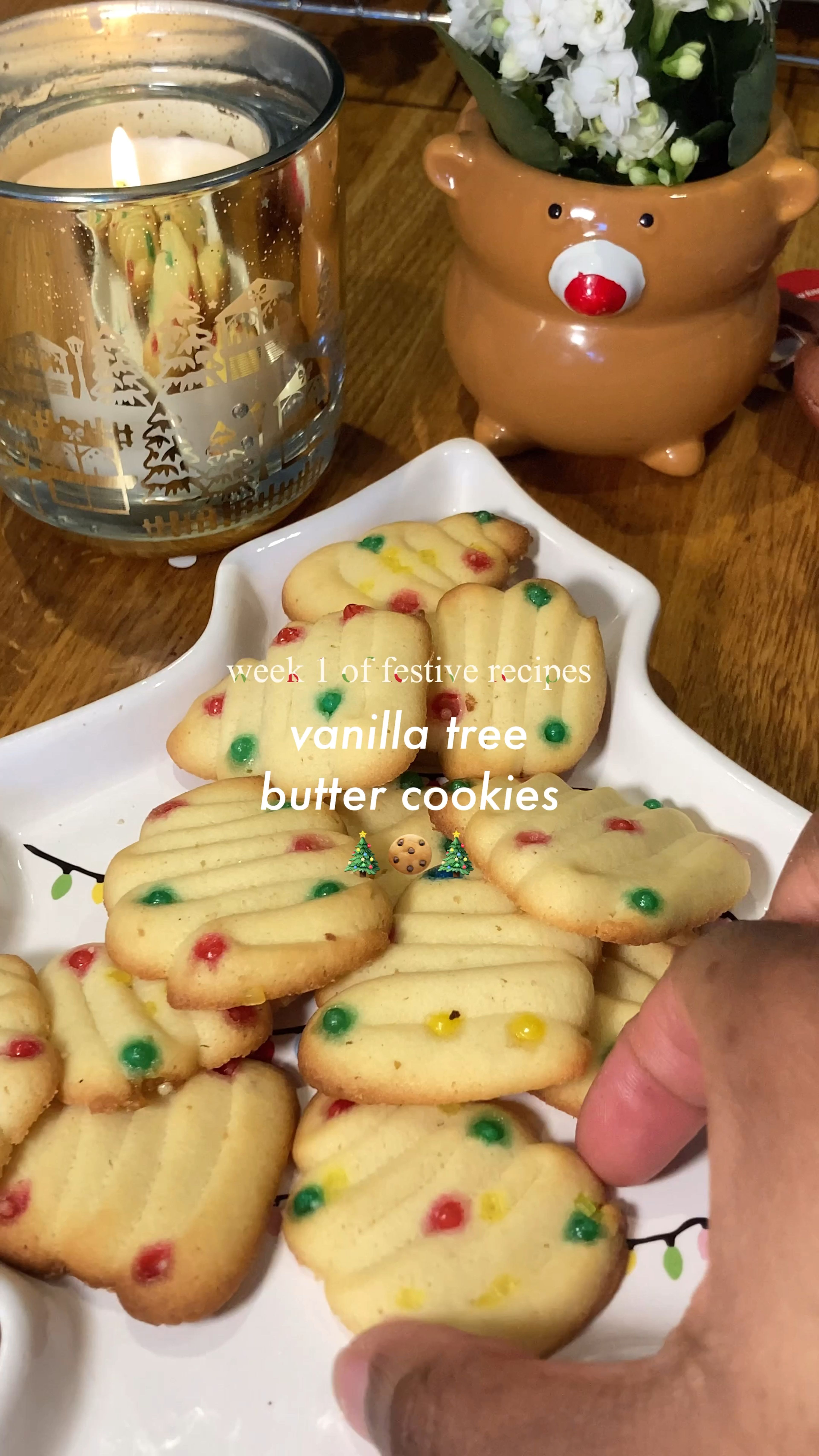 decorate piped cookies with red and green ball sprinkles