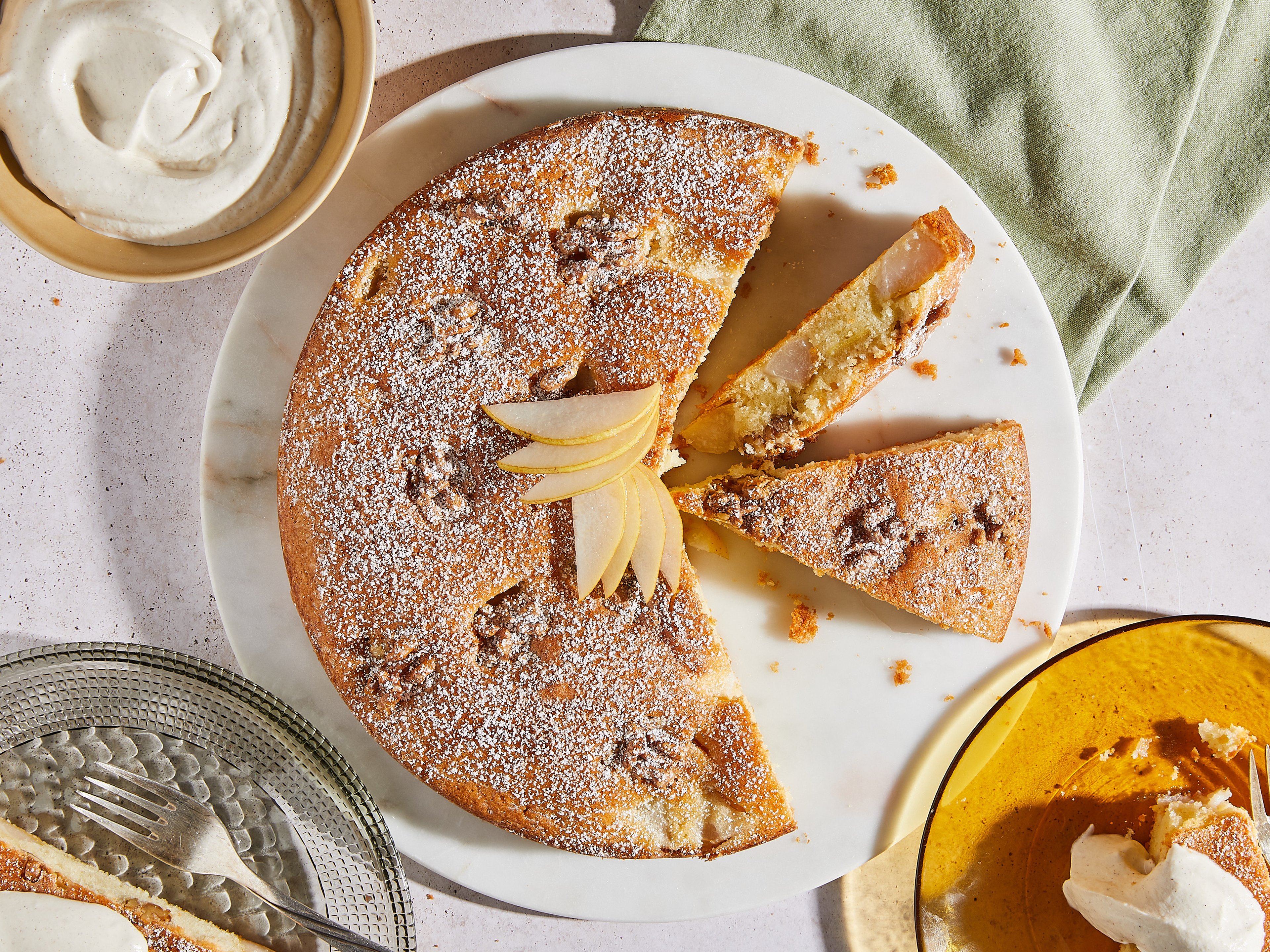 Easy pear cake with spiced whipped cream and walnuts