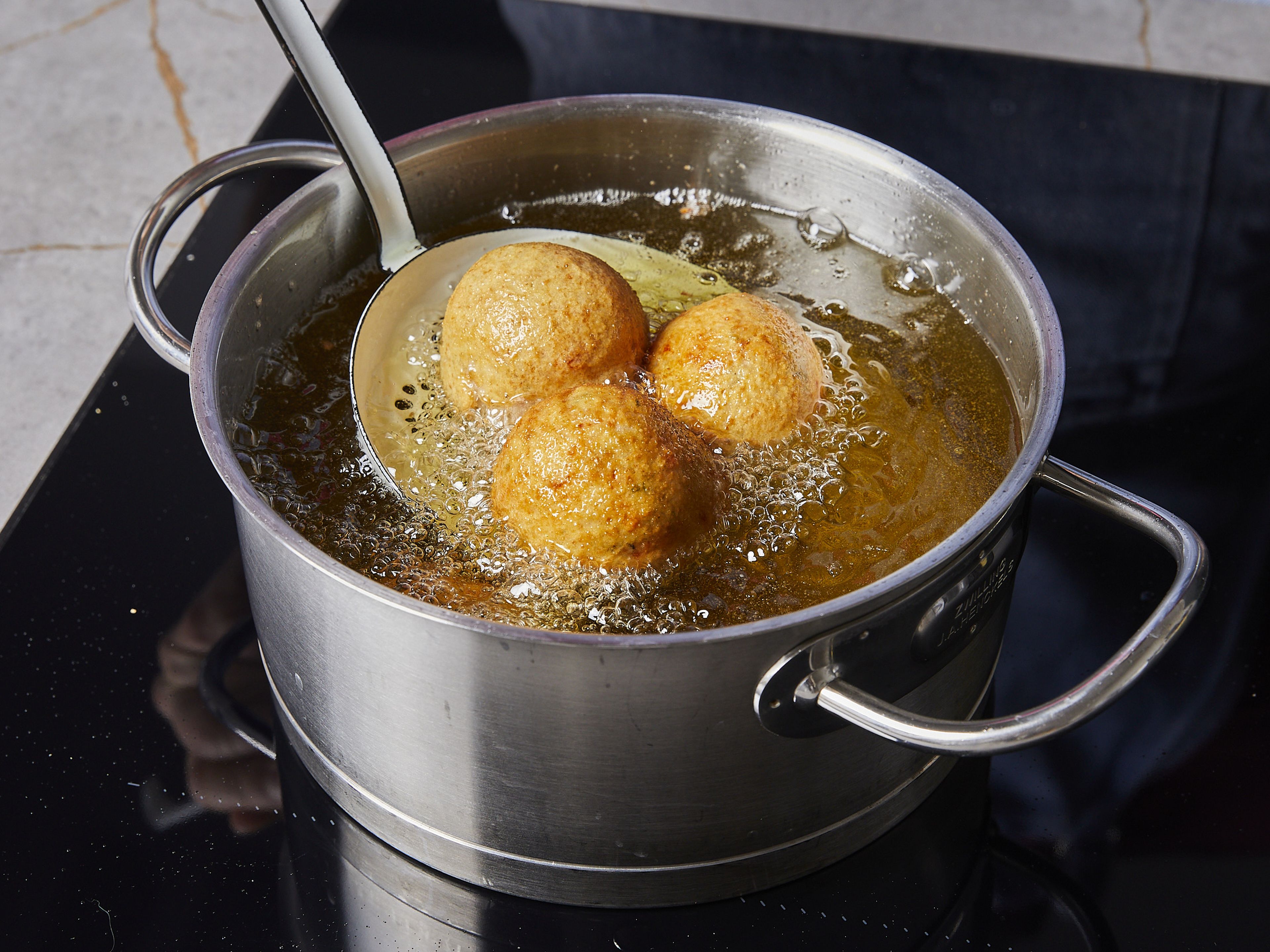 Heat vegetable oil in a small pot until it’s approx 180°C/350°F. Add arancini in batches and deep-fry until crispy and golden brown, approx. 6—7 min. Transfer to a paper towel to drain. Serve warm with Marinara sauce for dipping.
