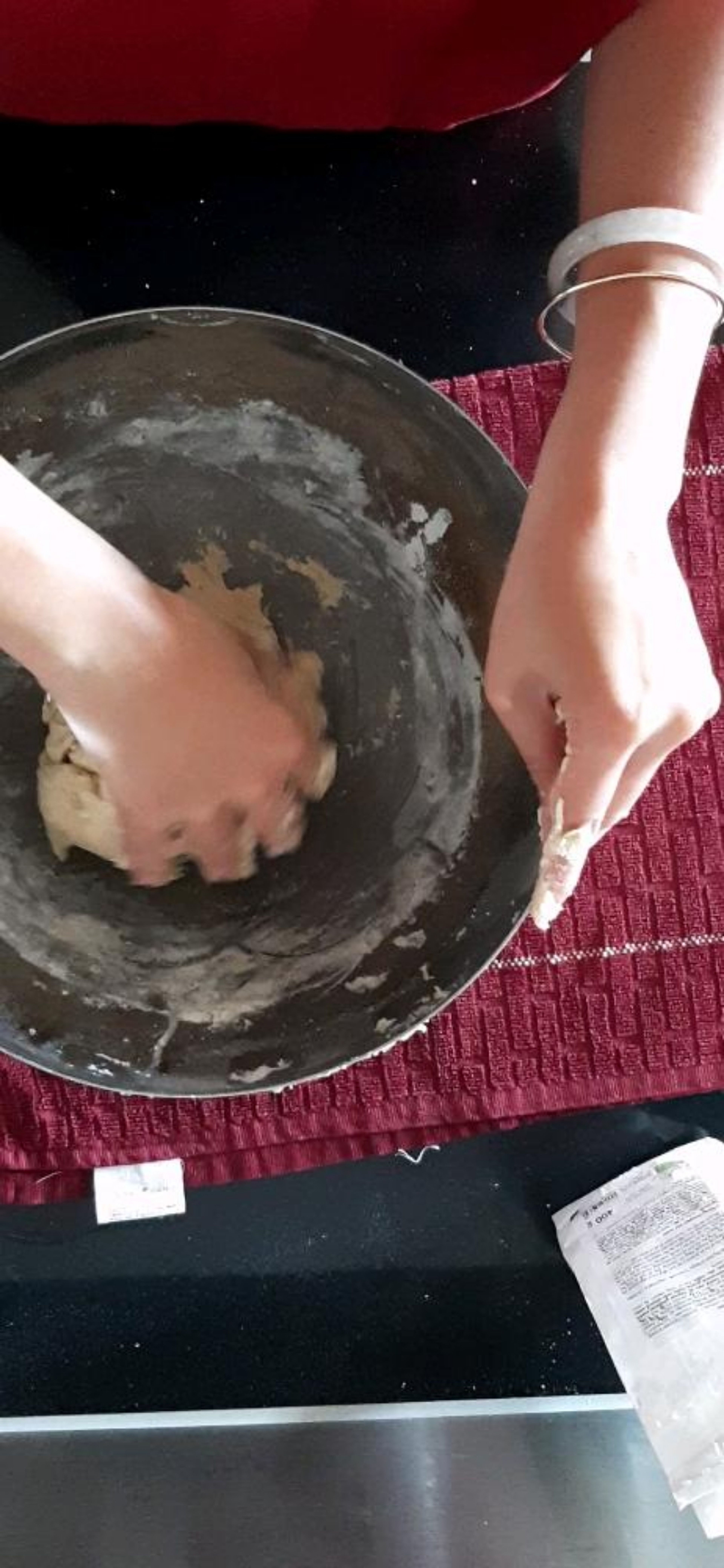 Mix the dough. It may be a bit sticky, so I add some flour to coat it and then I can roll it easily.