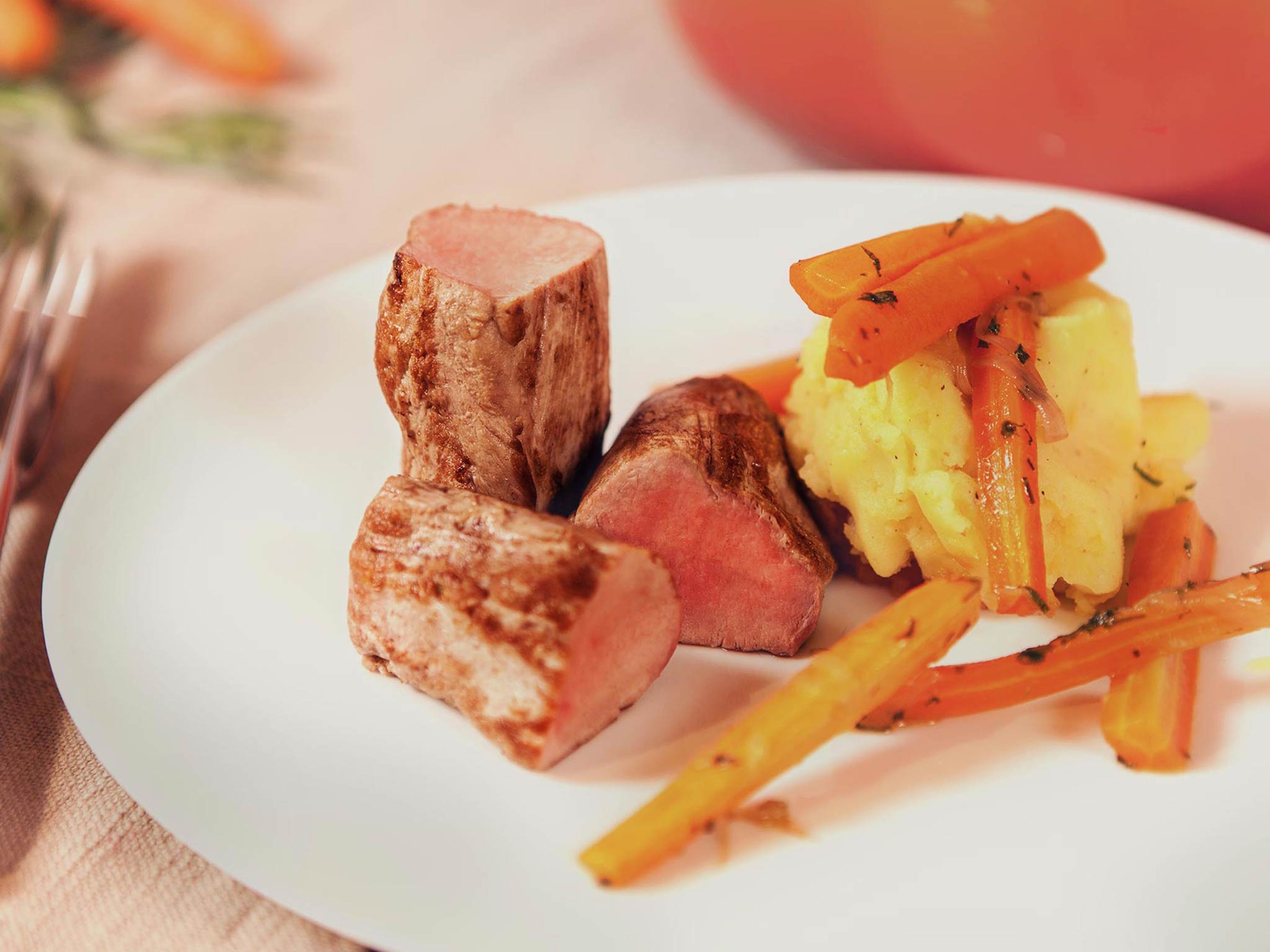 Pork tenderloin with tarragon carrots and mashed potatoes