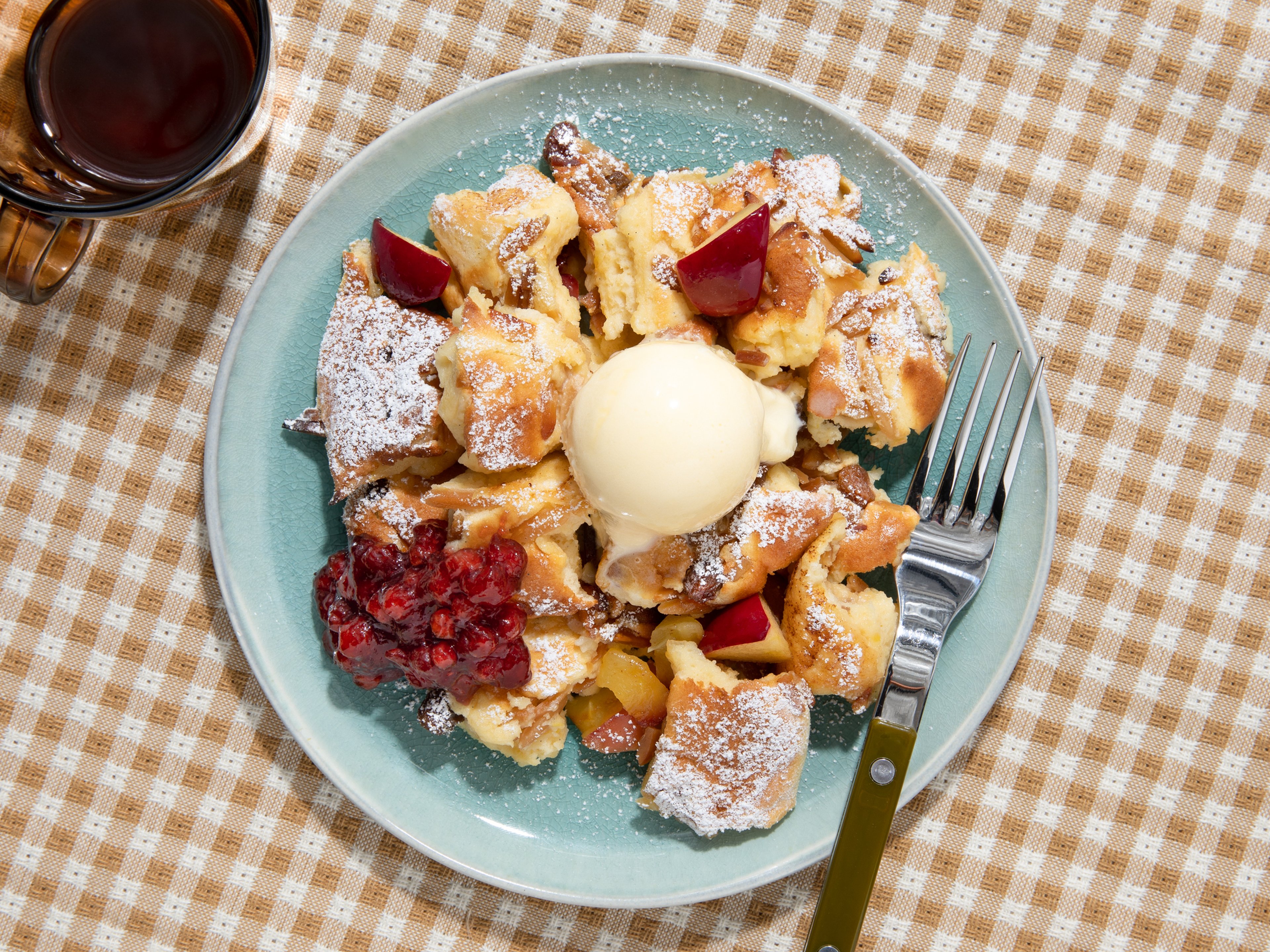 Fluffy Kaiserschmarrn with sour cream and apple