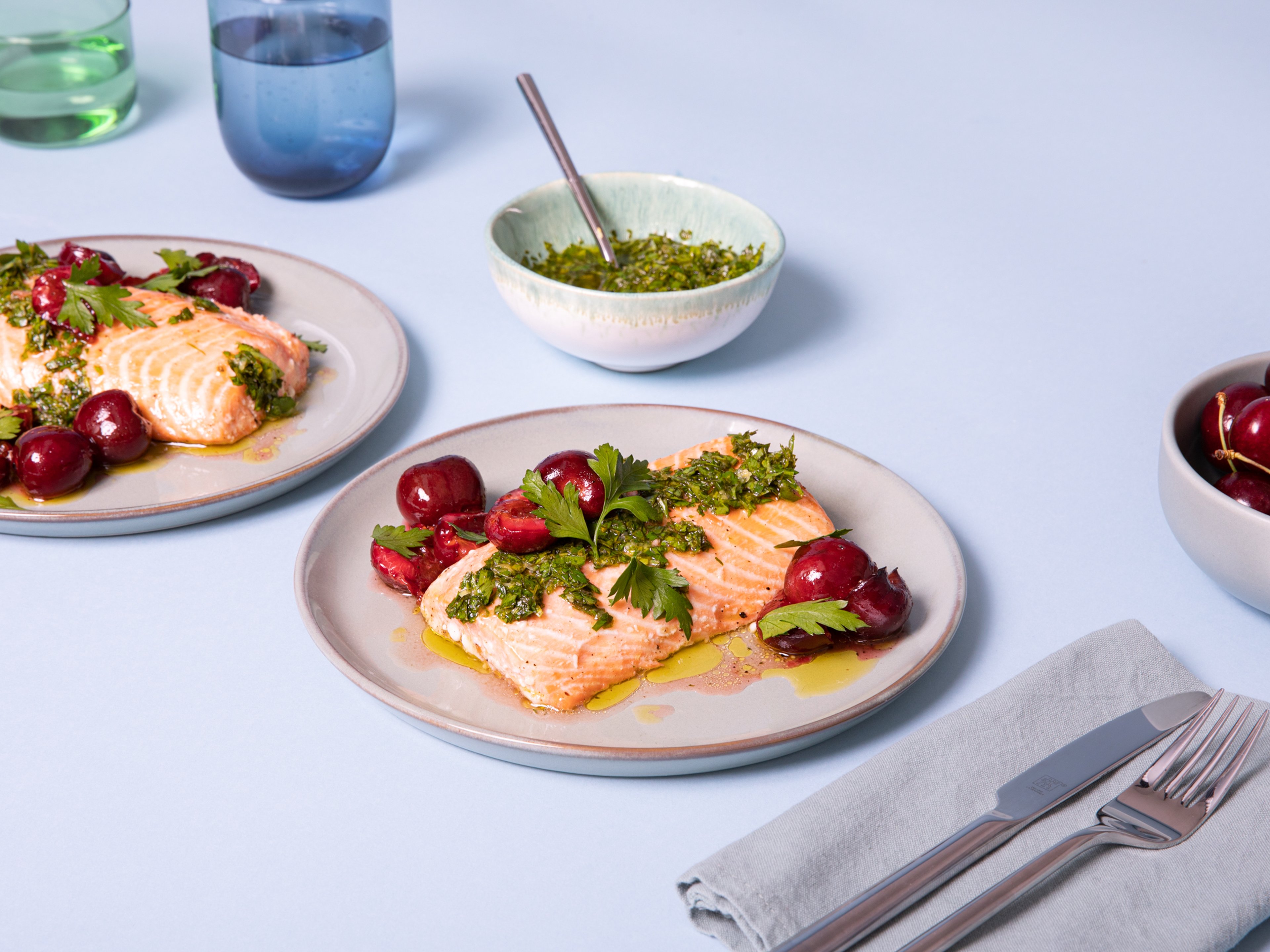 Parchment-baked salmon with sour cherries and parsley gremolata