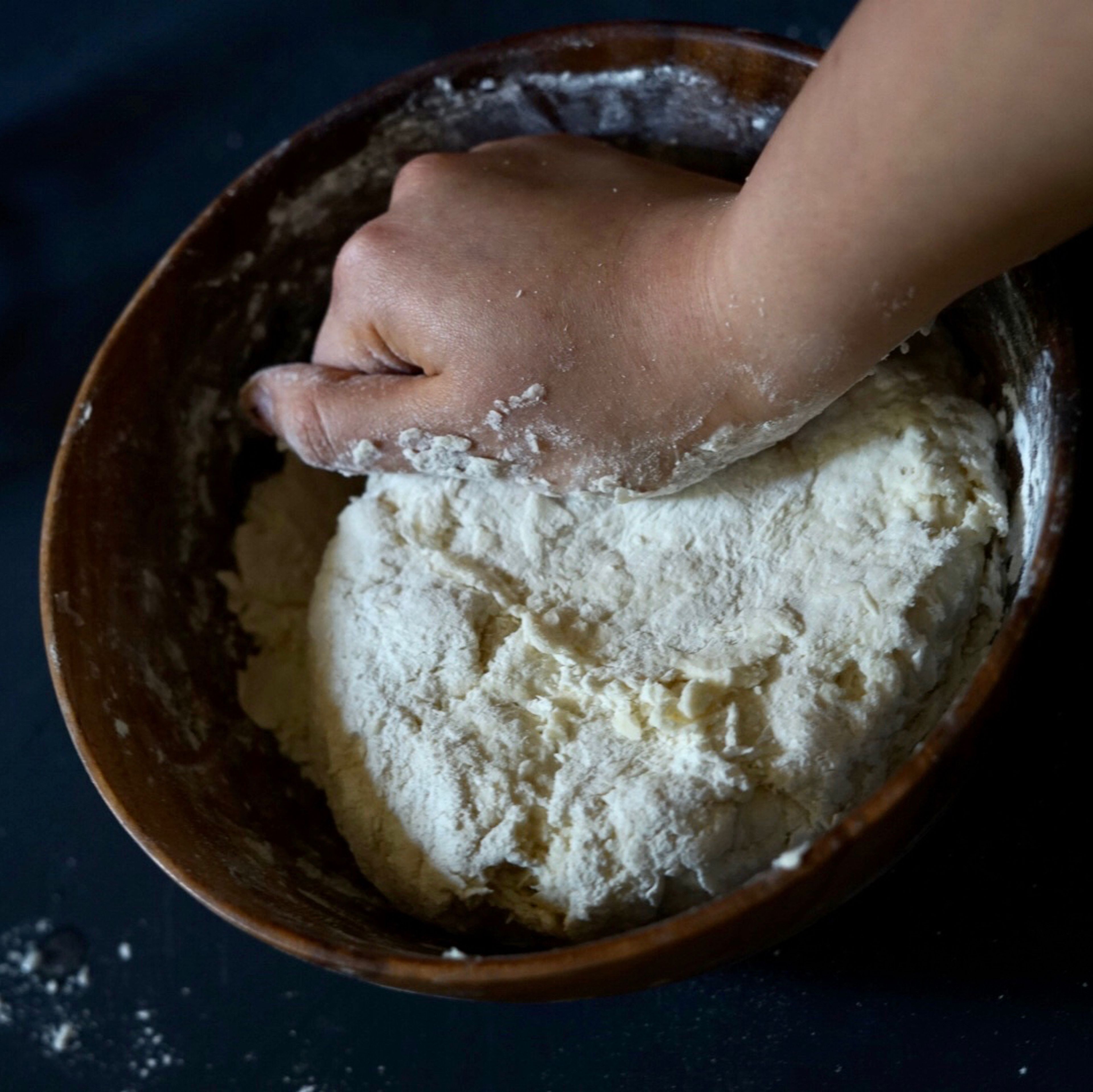Mix it with your hand until all flour are hydrated.