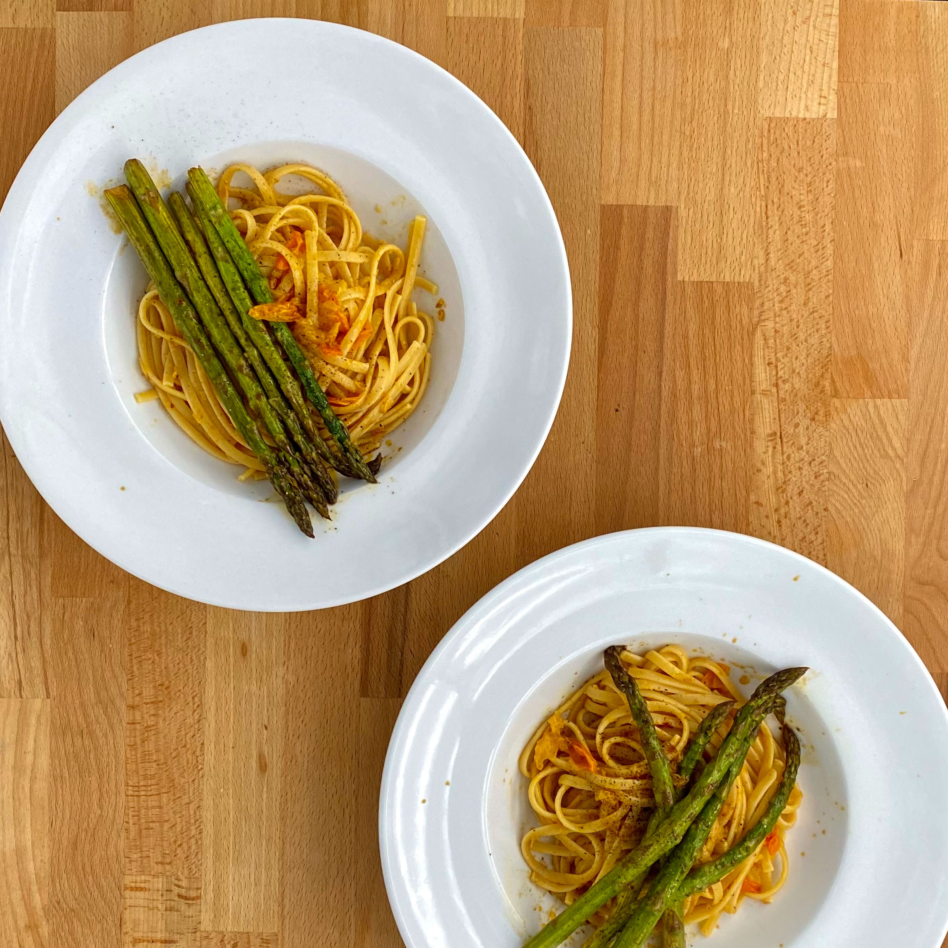 Arrange the spaghetti with the asparagus as you like. Before serving drizzle some of the asparagus marinade over the dish. This gives you that little bit of extra. Enjoy:)
