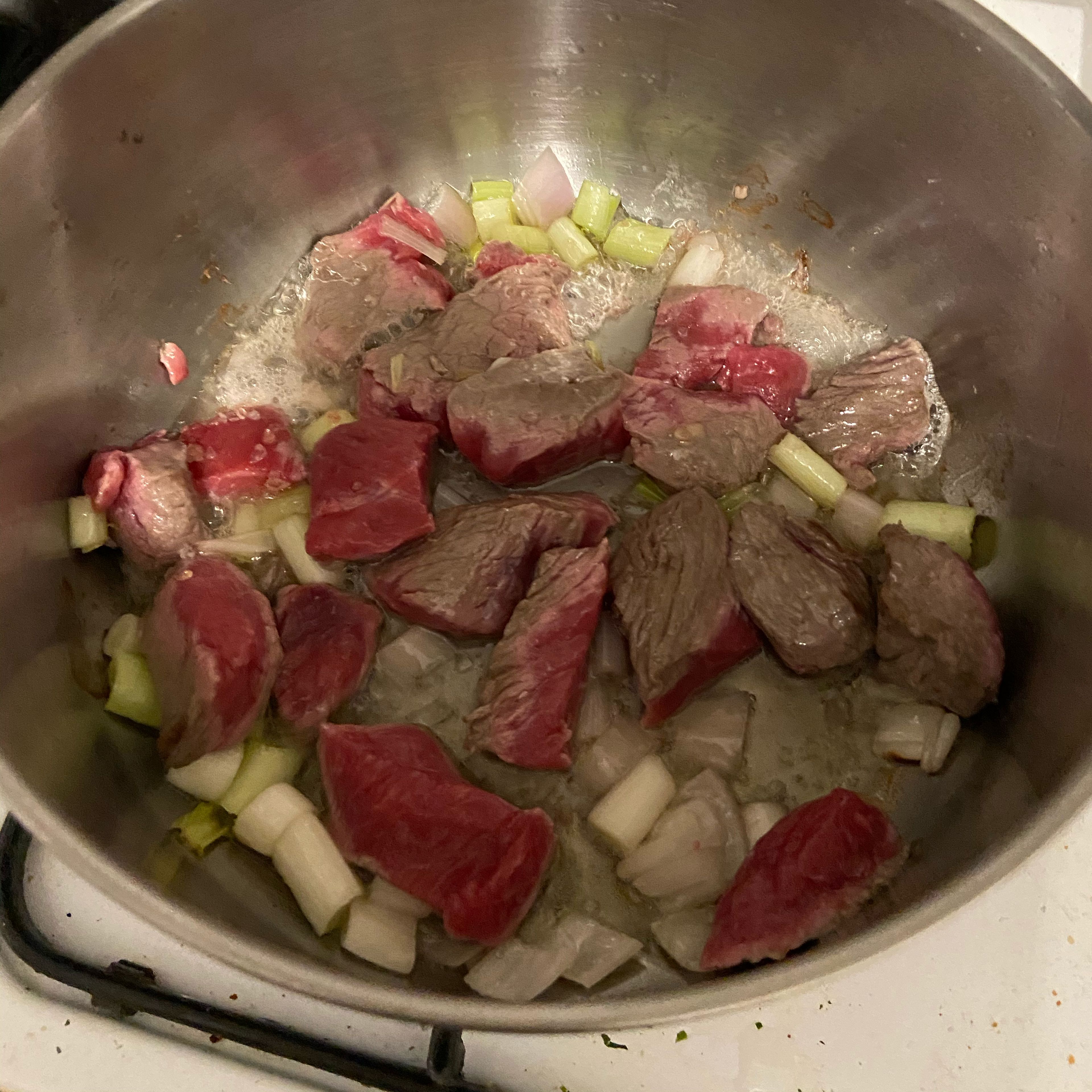 Sauté your meat in onion and garlic until it’s not red on the outside. I used beef chucks but lamb meat is the traditional way to go.