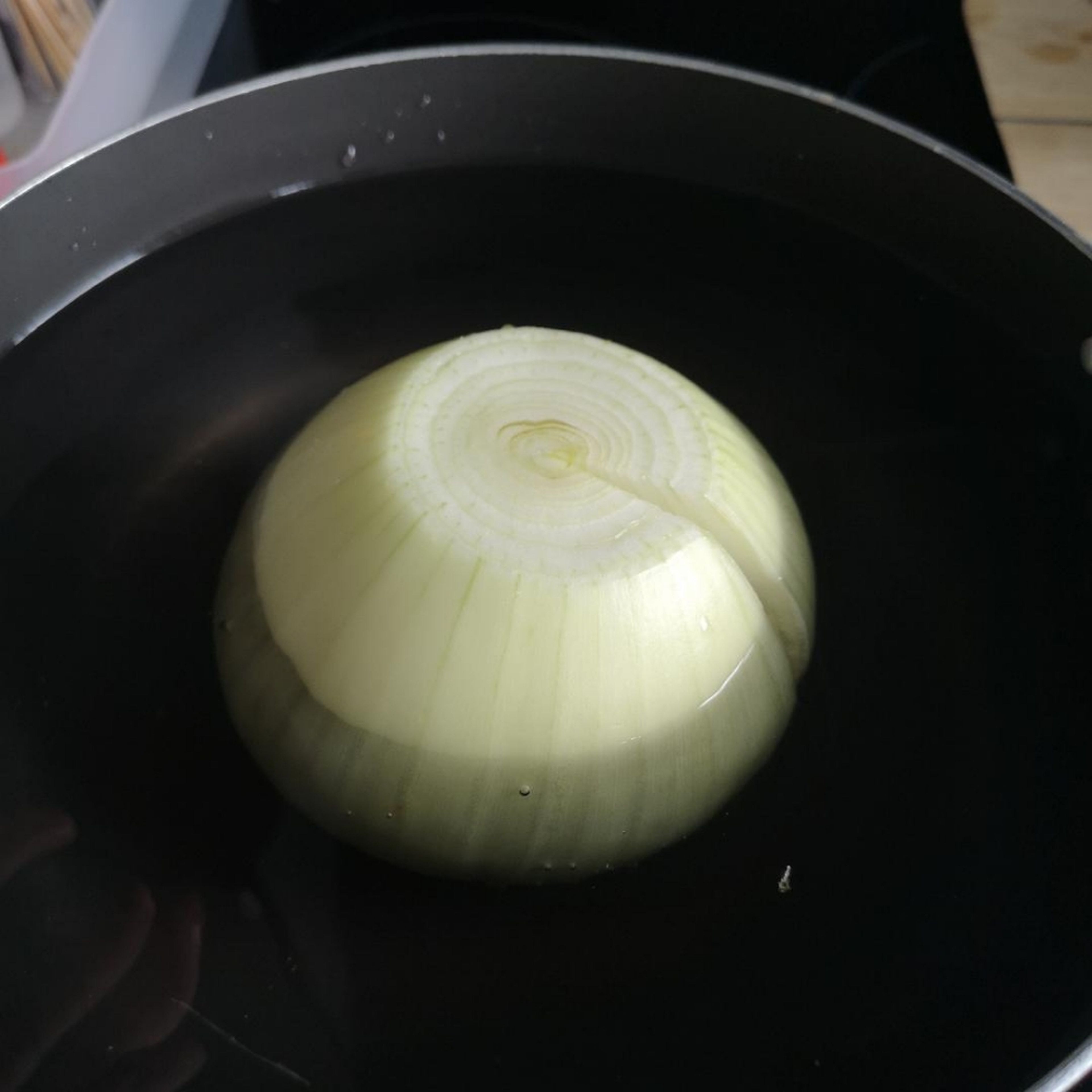 In a pot, cover the onions with cold water, and heat till you bring it to a boil, then reduce the heat and cook for 15 minutes until the onions are cooked through. make sure you salt your water!