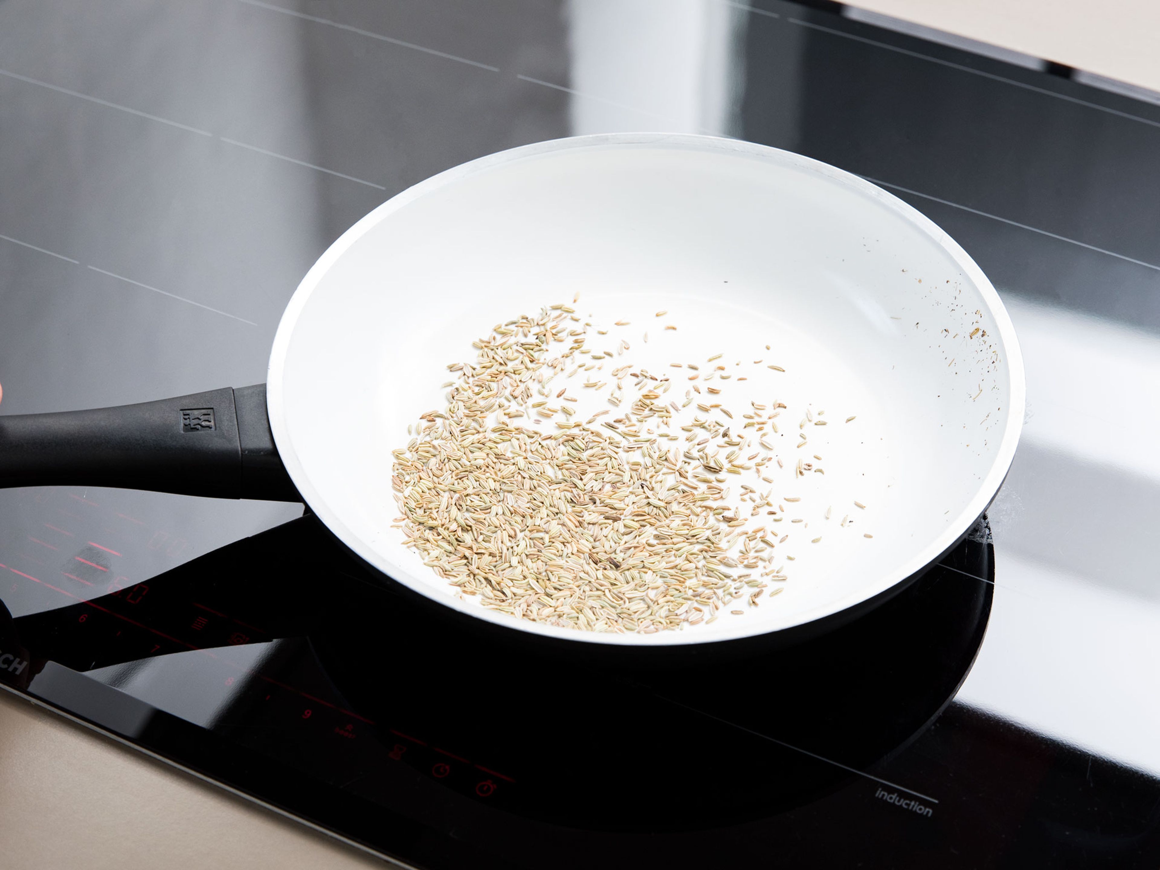 Toast fennel seeds in a frying pan over medium-low heat until fragrant, approx. 2 min.