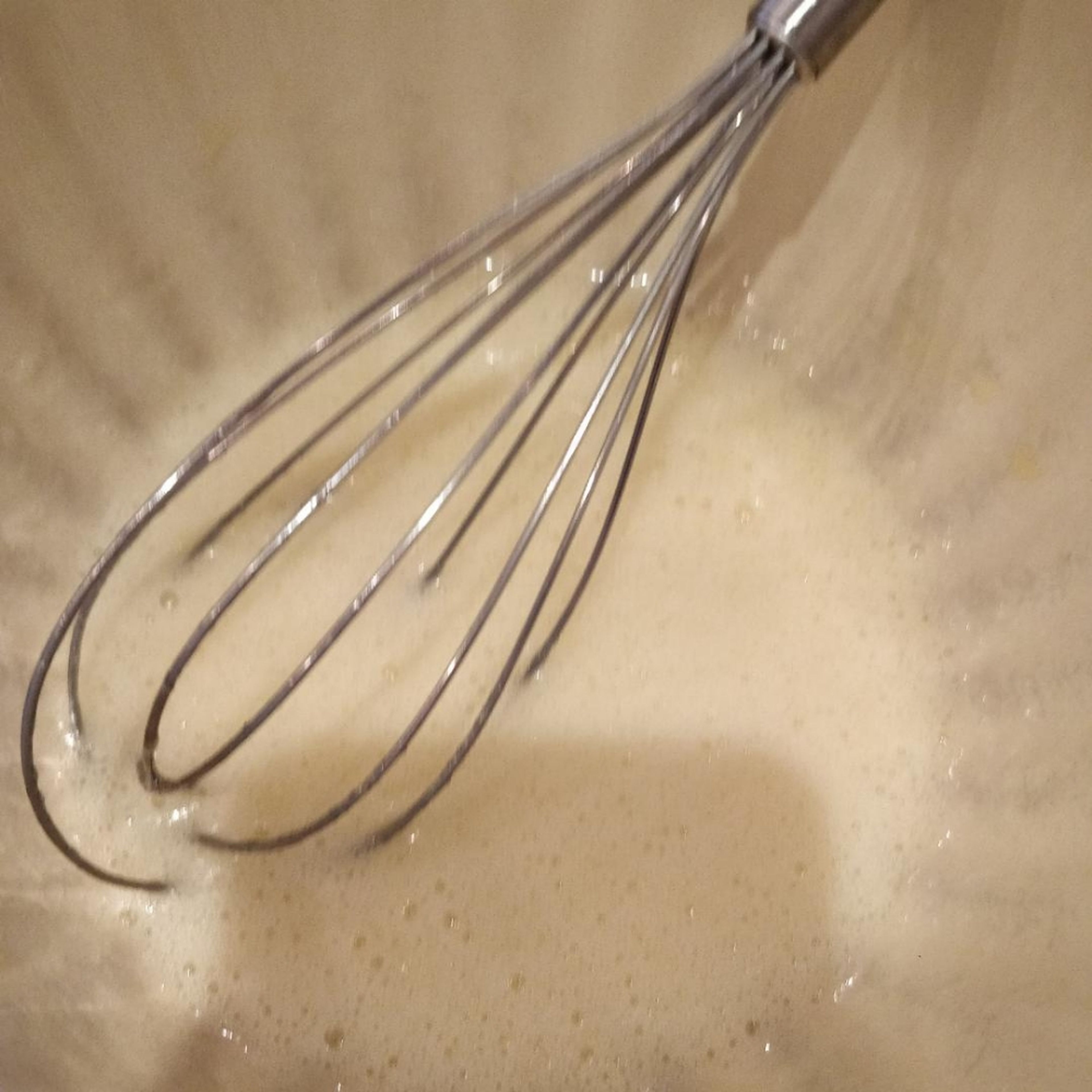 Whisk in the butter and sugar