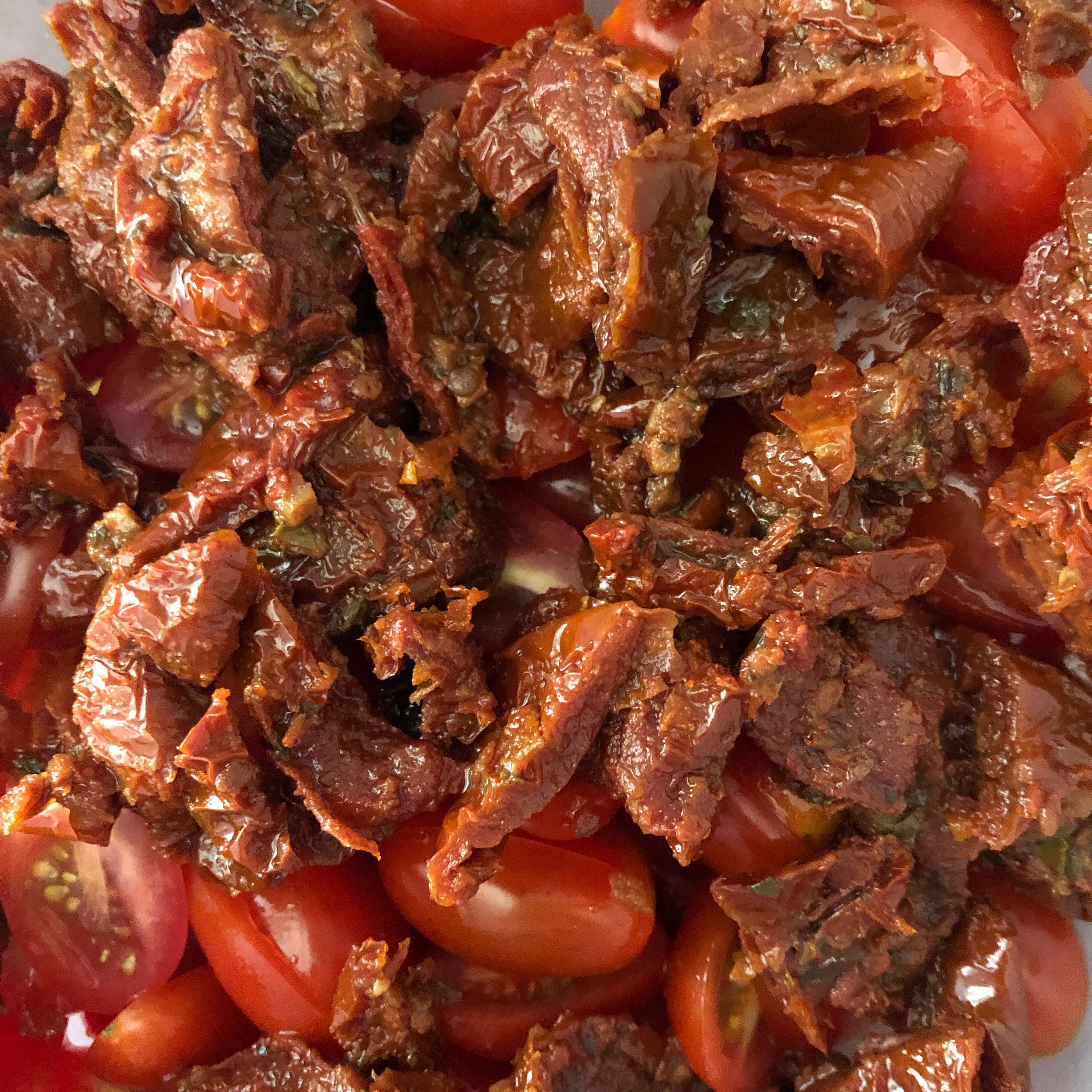 Cut dried tomatoes and paprika into small pieces and add to bowl.