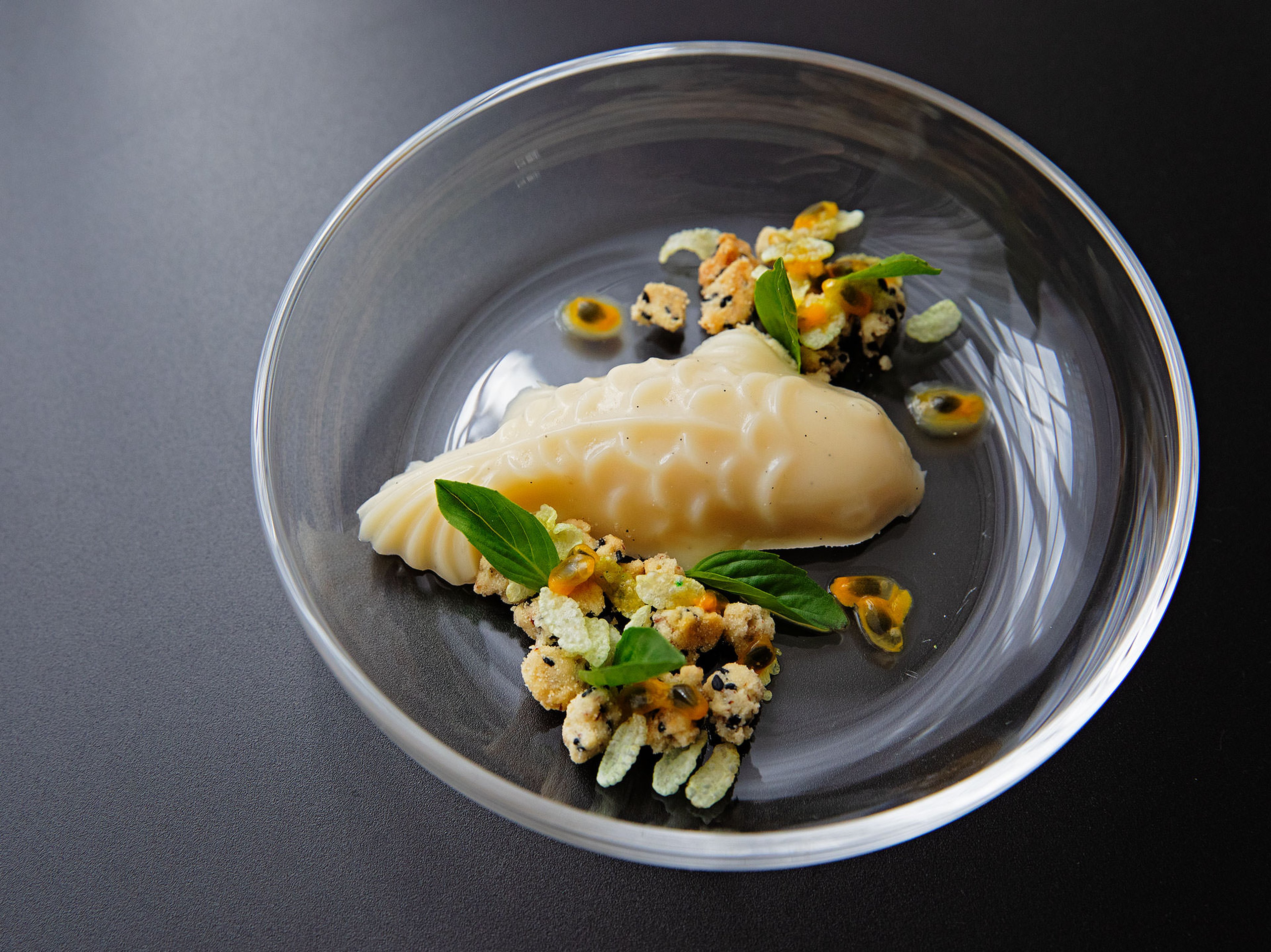 Honey pudding with sesame-rice crumble and passion fruit