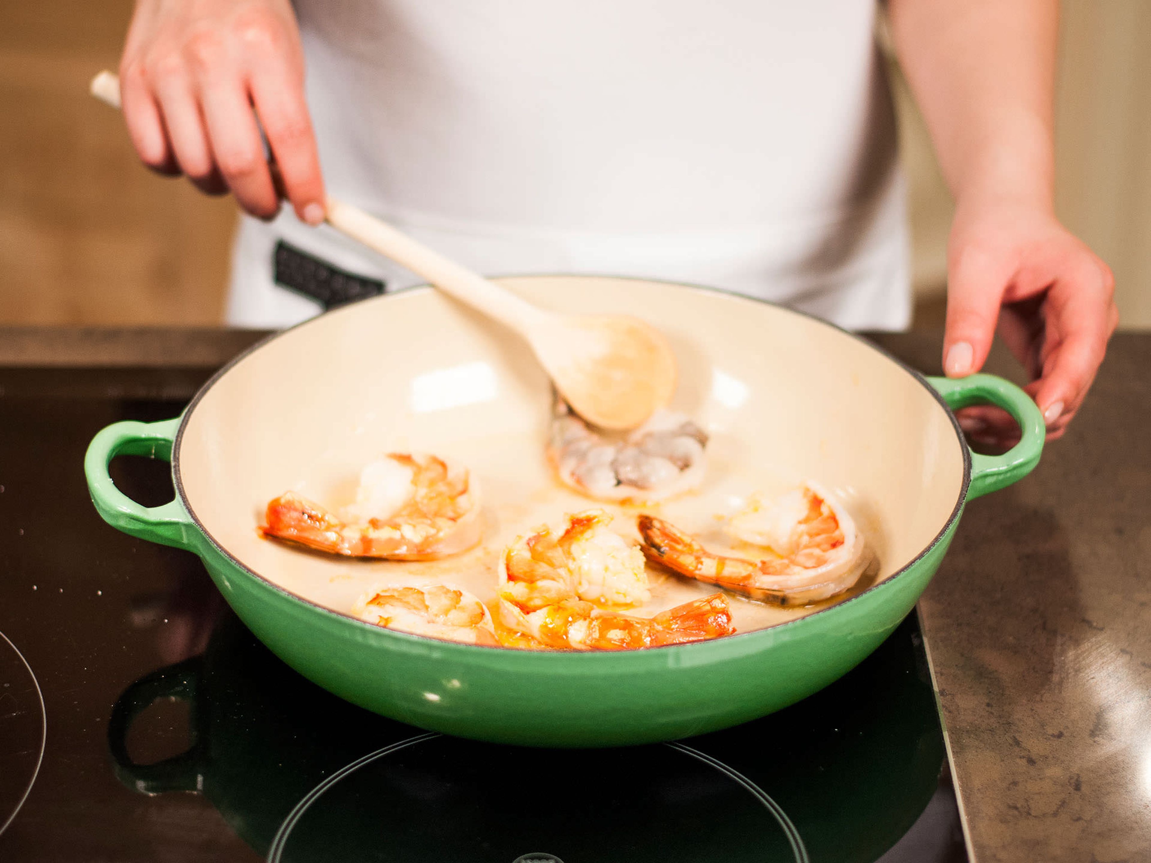 Heat up some olive oil in a frying pan and sear shrimp for approx. 3 – 4 min. until opaque.