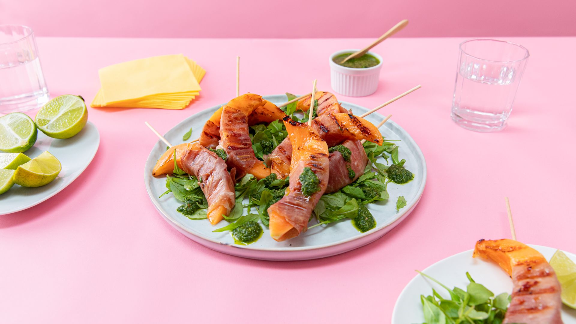 Grilled prosciutto-wrapped cantaloupe with chimichurri
