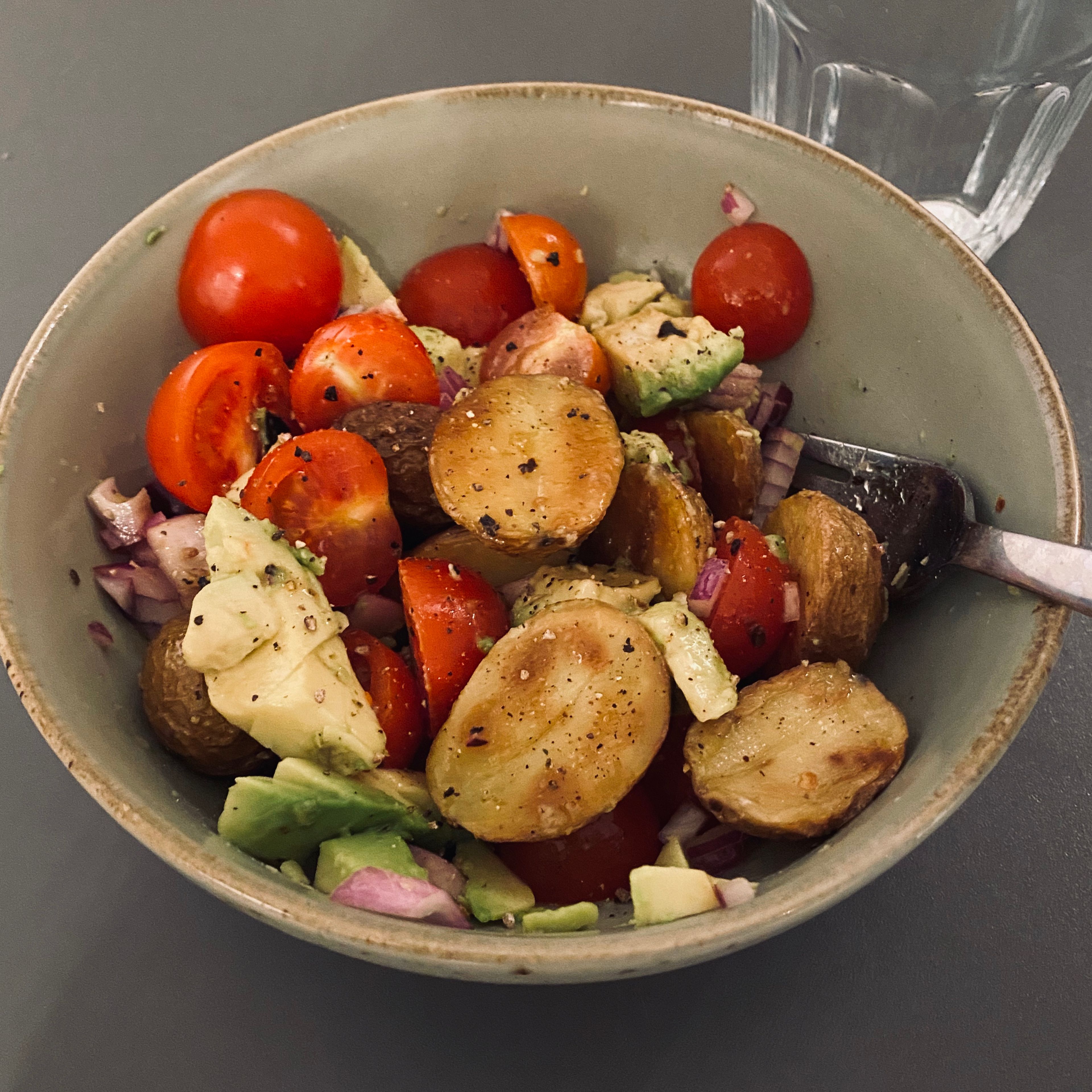 Simple potato salad with avocado and tomatoes