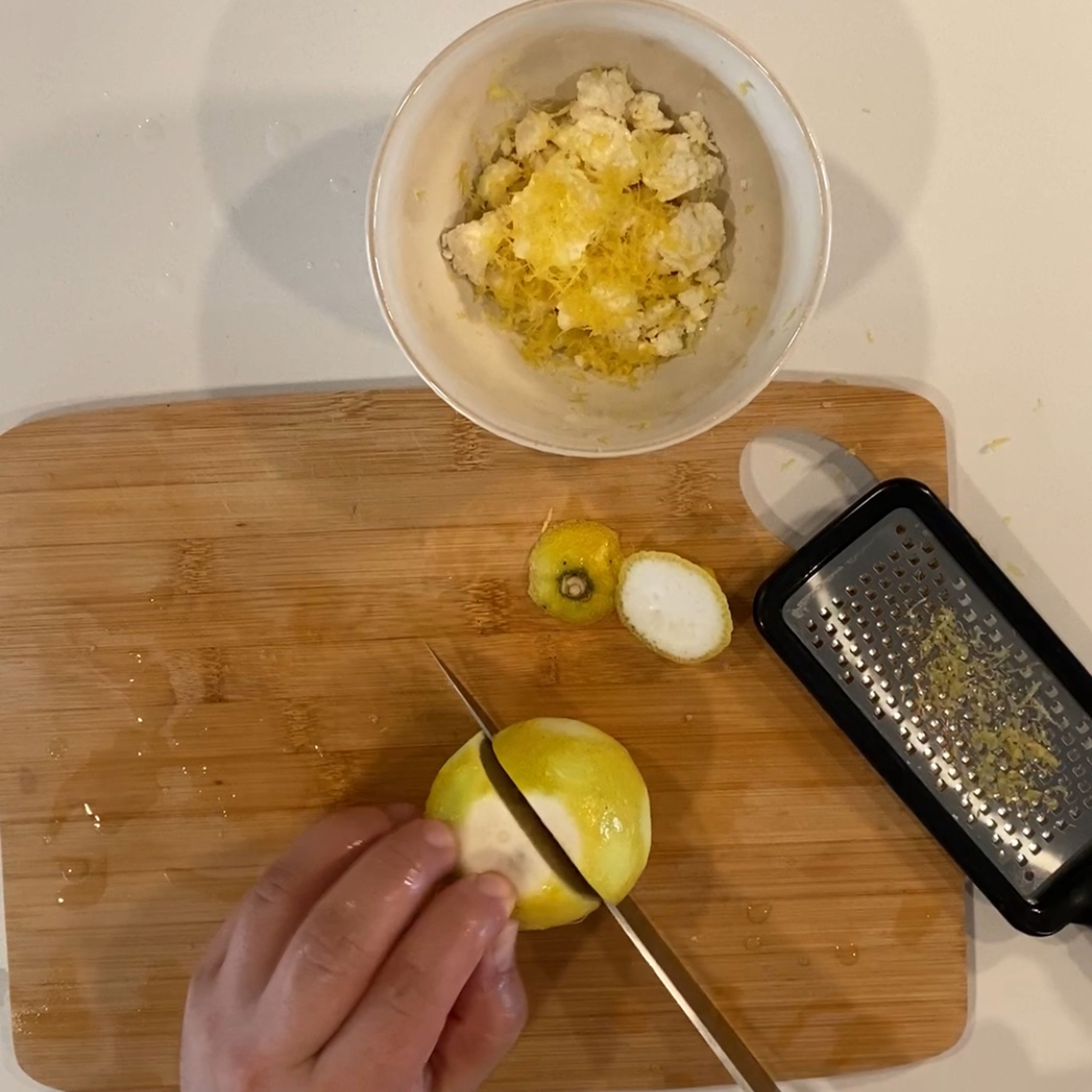 Cut lemon into 4 - 6 pieces for later use