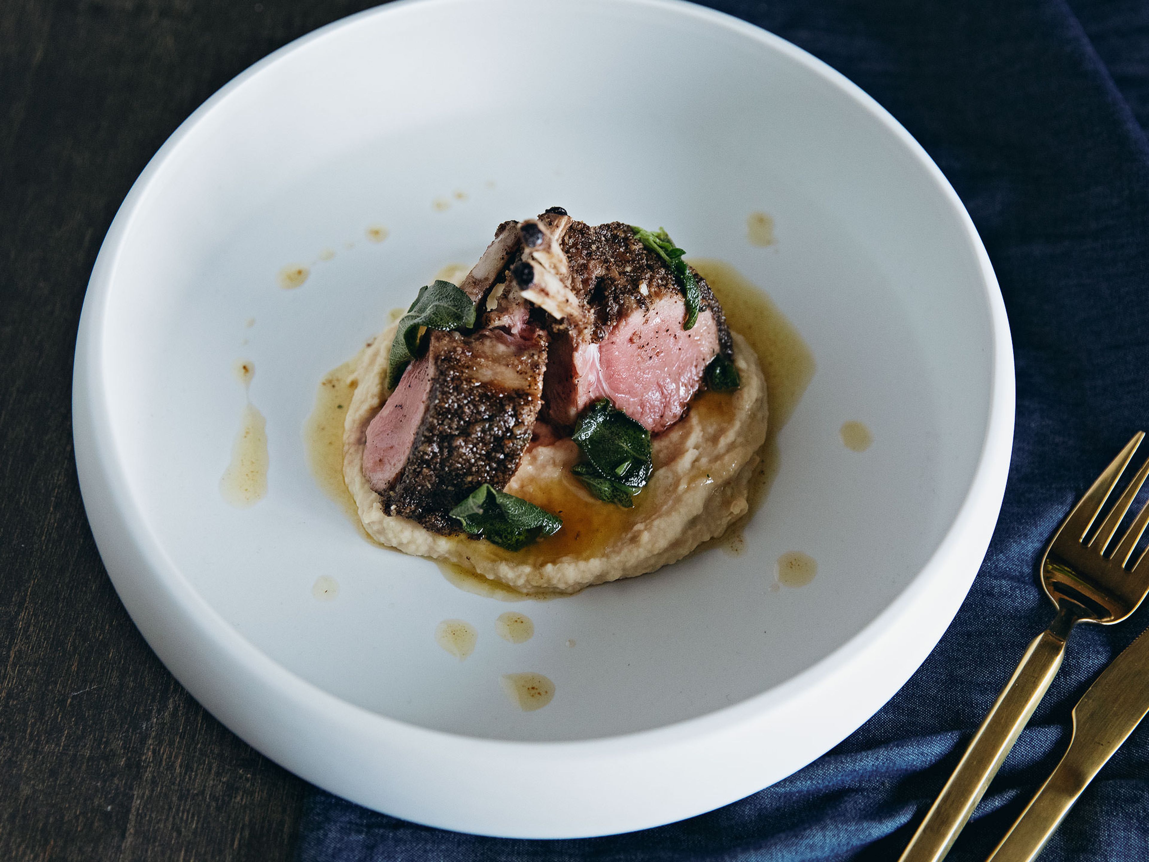 Coffee-crusted rack of lamb with white bean purée