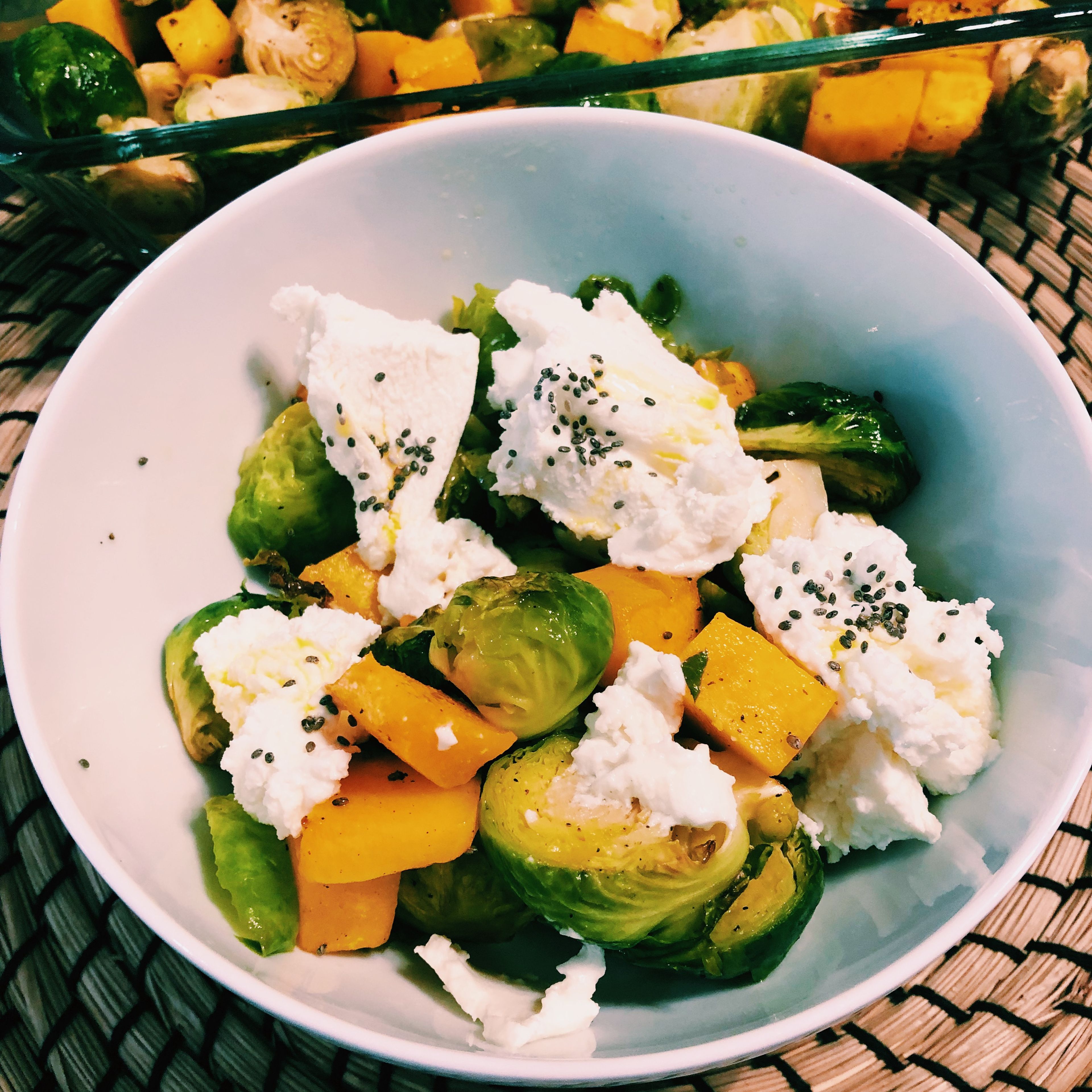 Serve dish in a bowl and add a few spoons of soft goat cheese. Garnish with chia seeds and a bit of maple syrup.