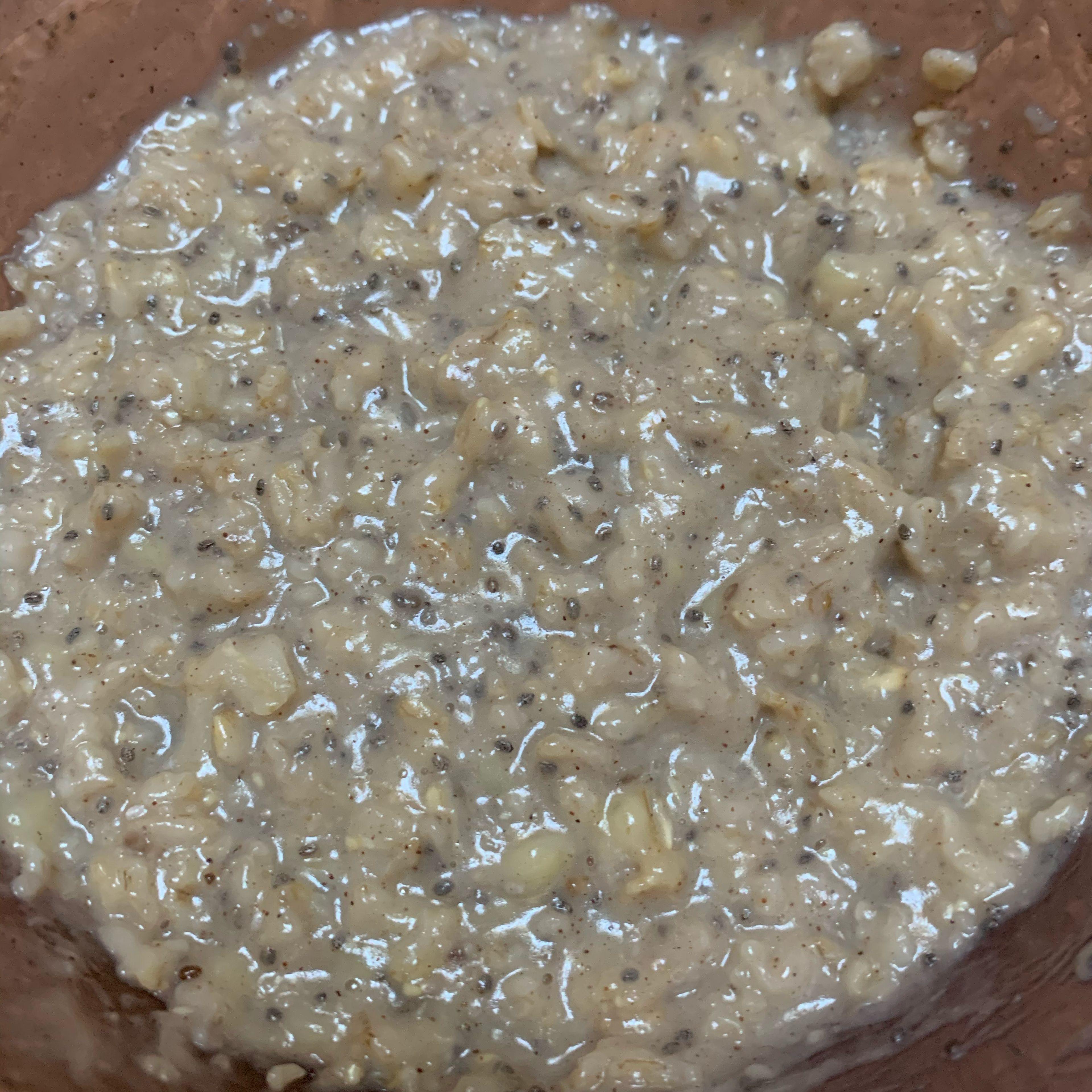 Add chia seeds, stir to combine, and add oat mixture to a container
